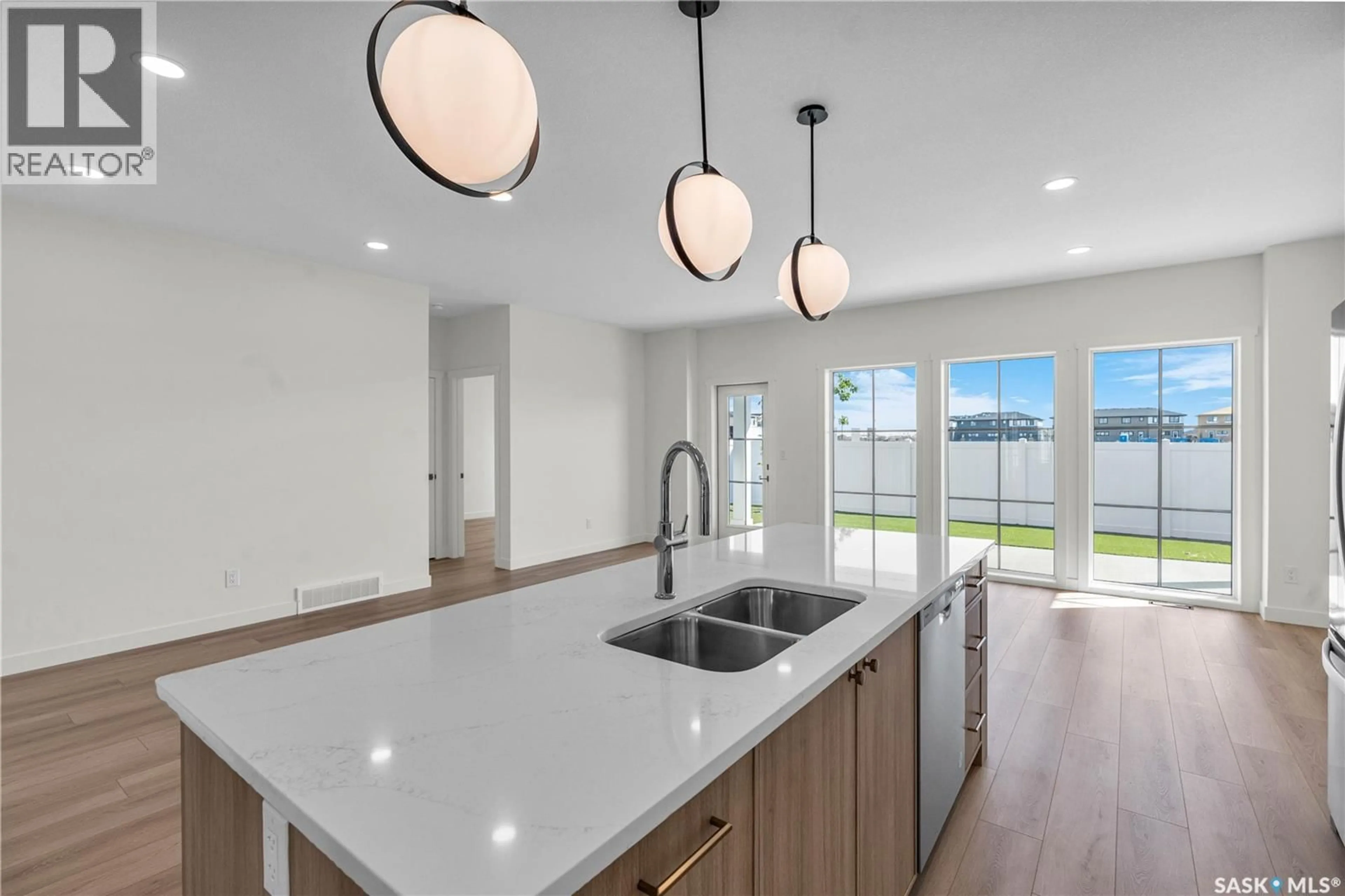 Open concept kitchen, ceramic/tile floor for 6 - 720 BRIGHTON BOULEVARD, Saskatoon Saskatchewan S7V1X1