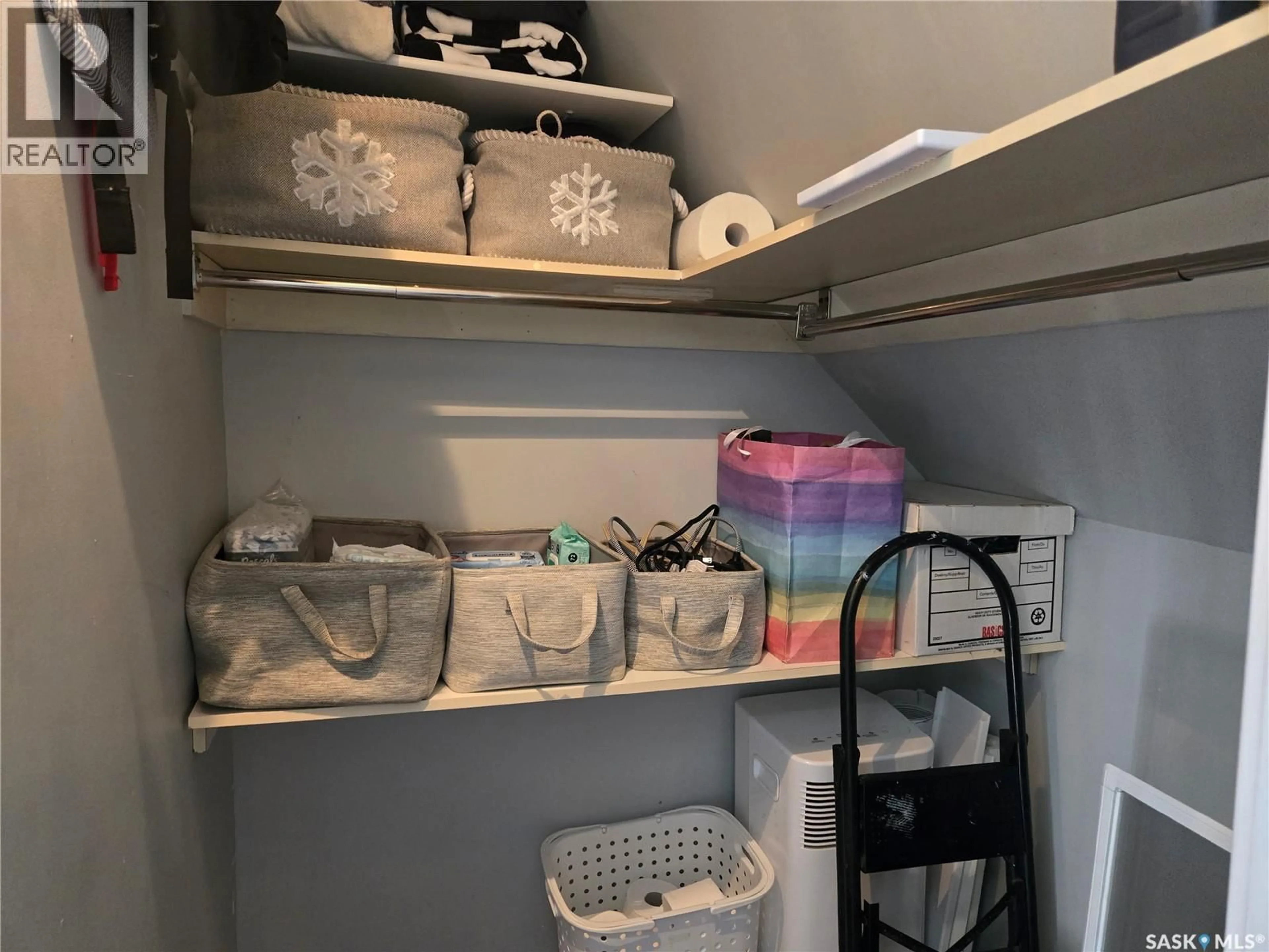 Storage room or clothes room or walk-in closet for 209 28TH STREET, Saskatoon Saskatchewan S7L0K4