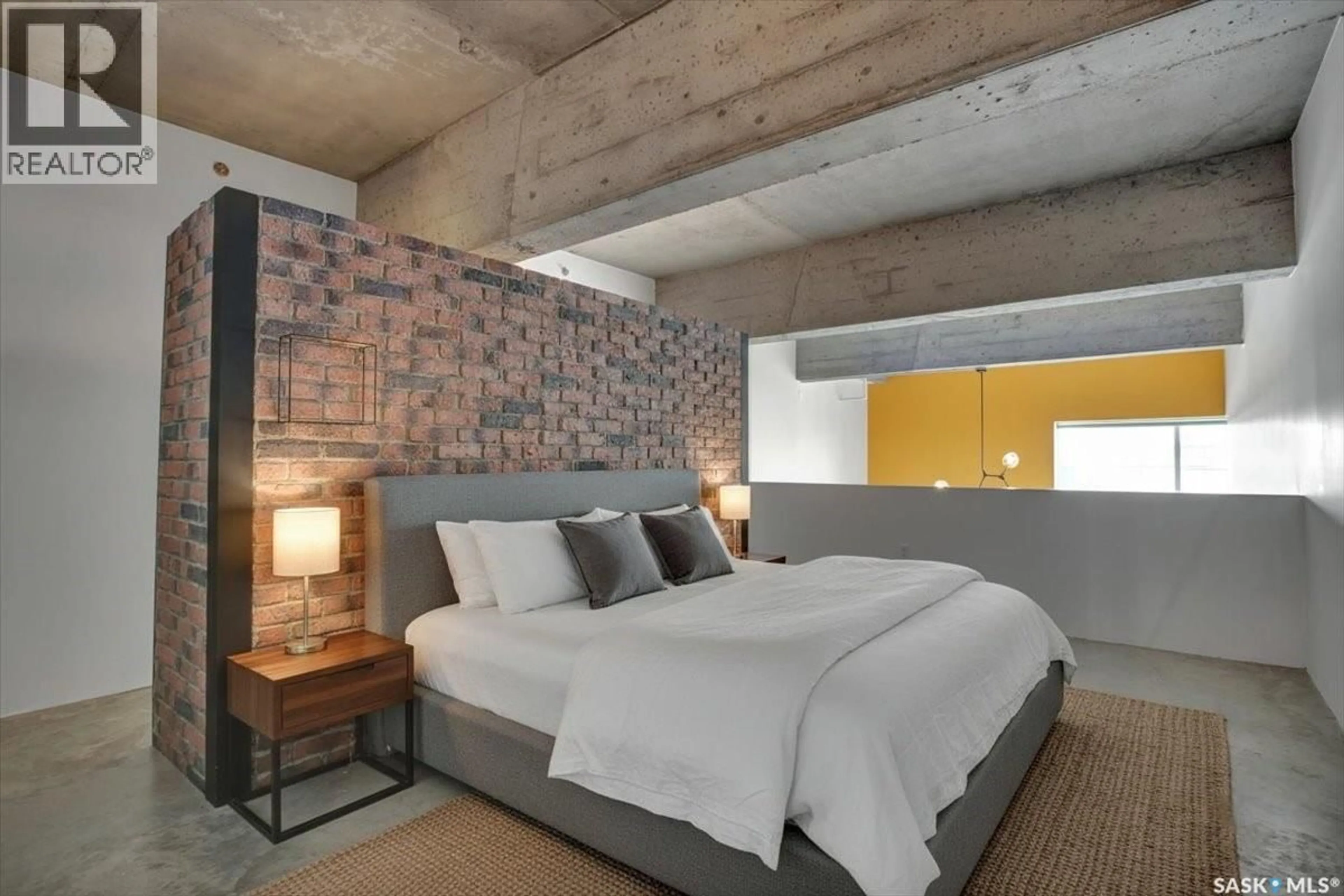 Bedroom with bed, cement floor for 223 120 23RD STREET E, Saskatoon Saskatchewan S7K0K8