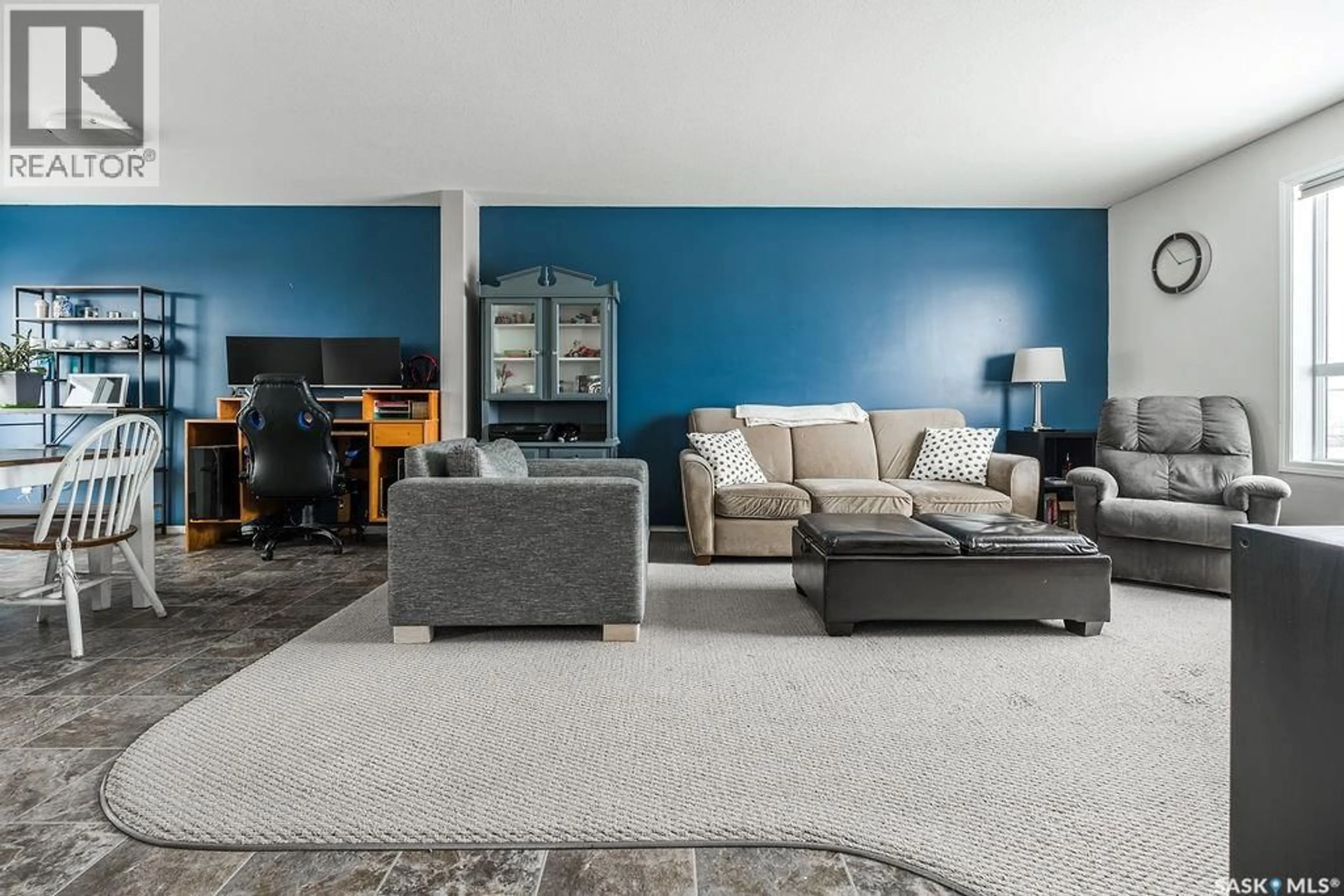 Living room with furniture, carpet floor for 31 200 HIEBERT CRESCENT, Martensville Saskatchewan S0K2T2