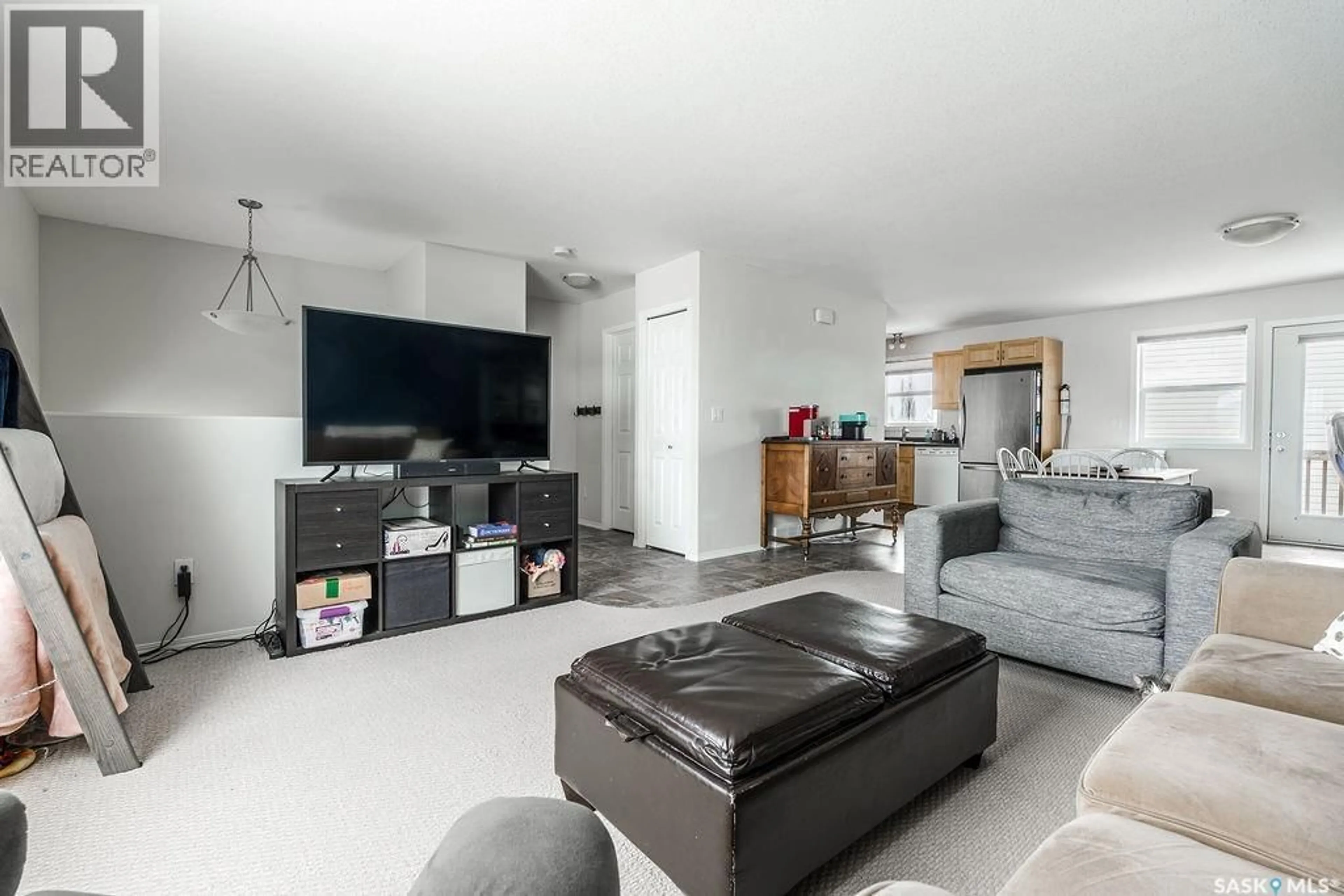 Living room with furniture, unknown for 31 200 HIEBERT CRESCENT, Martensville Saskatchewan S0K2T2