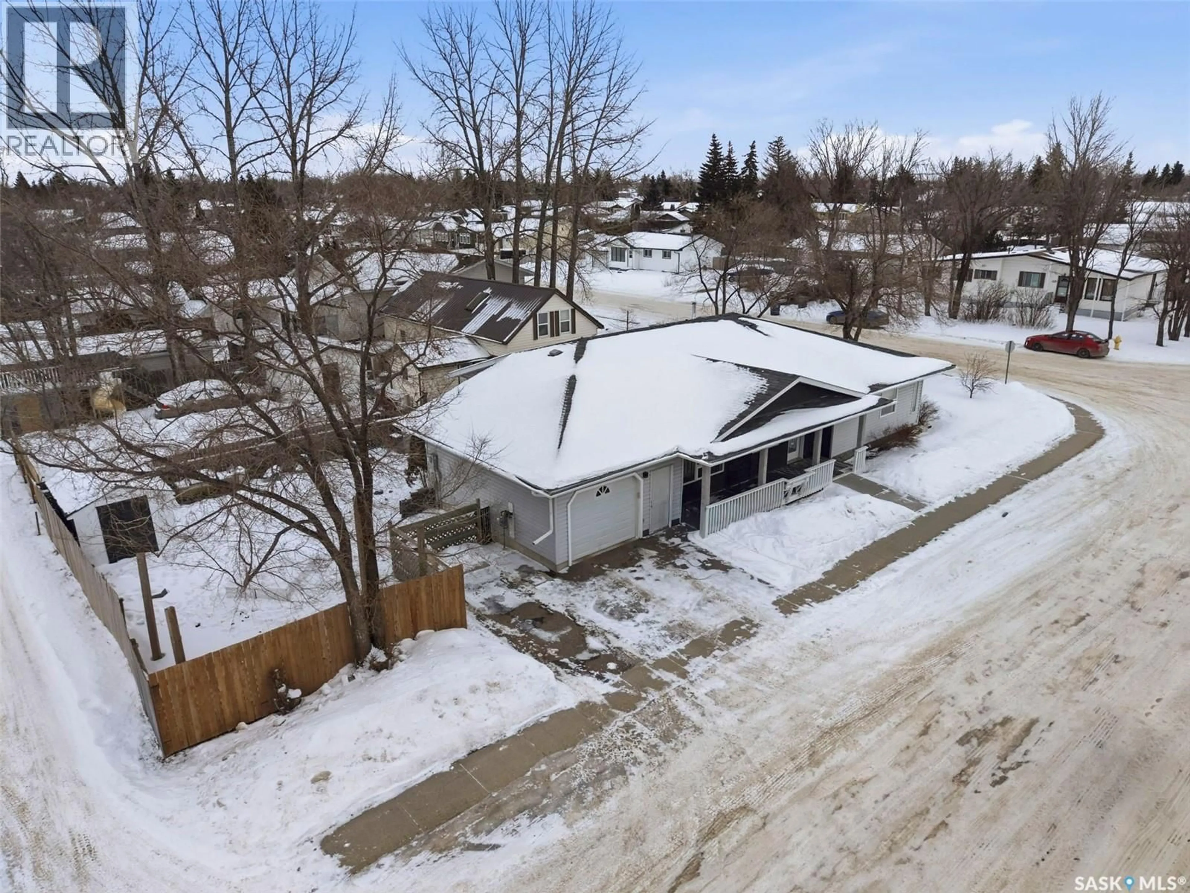 A pic from outside/outdoor area/front of a property/back of a property/a pic from drone, street for S - 7 101 2ND STREET, Martensville Saskatchewan S0K2T0