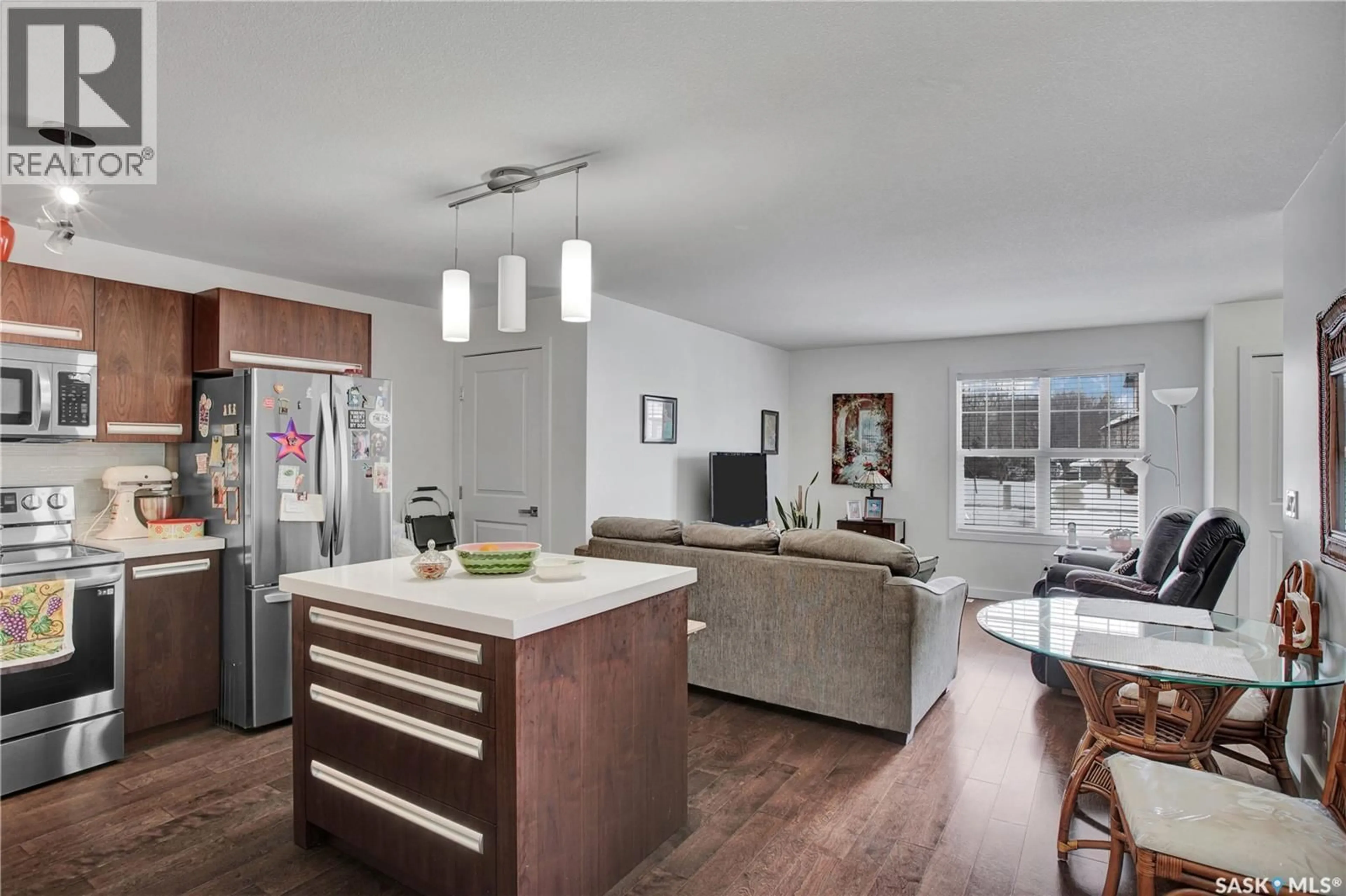 Open concept kitchen, wood/laminate floor for 2315 - 421 MCCLOCKLIN ROAD, Saskatoon Saskatchewan S7R0K8