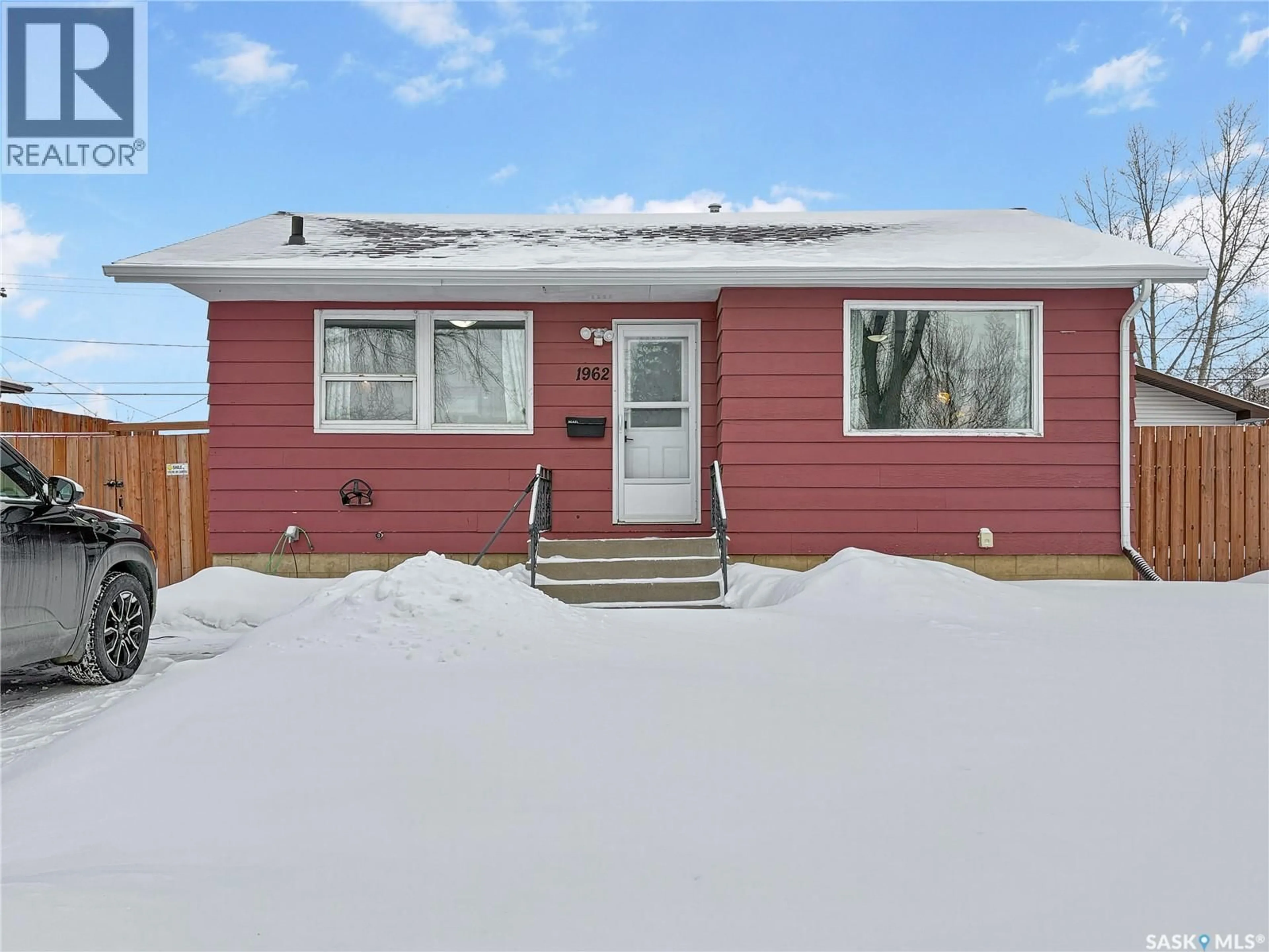 Home with vinyl exterior material, street for 1962 101ST STREET, North Battleford Saskatchewan S9A1B3