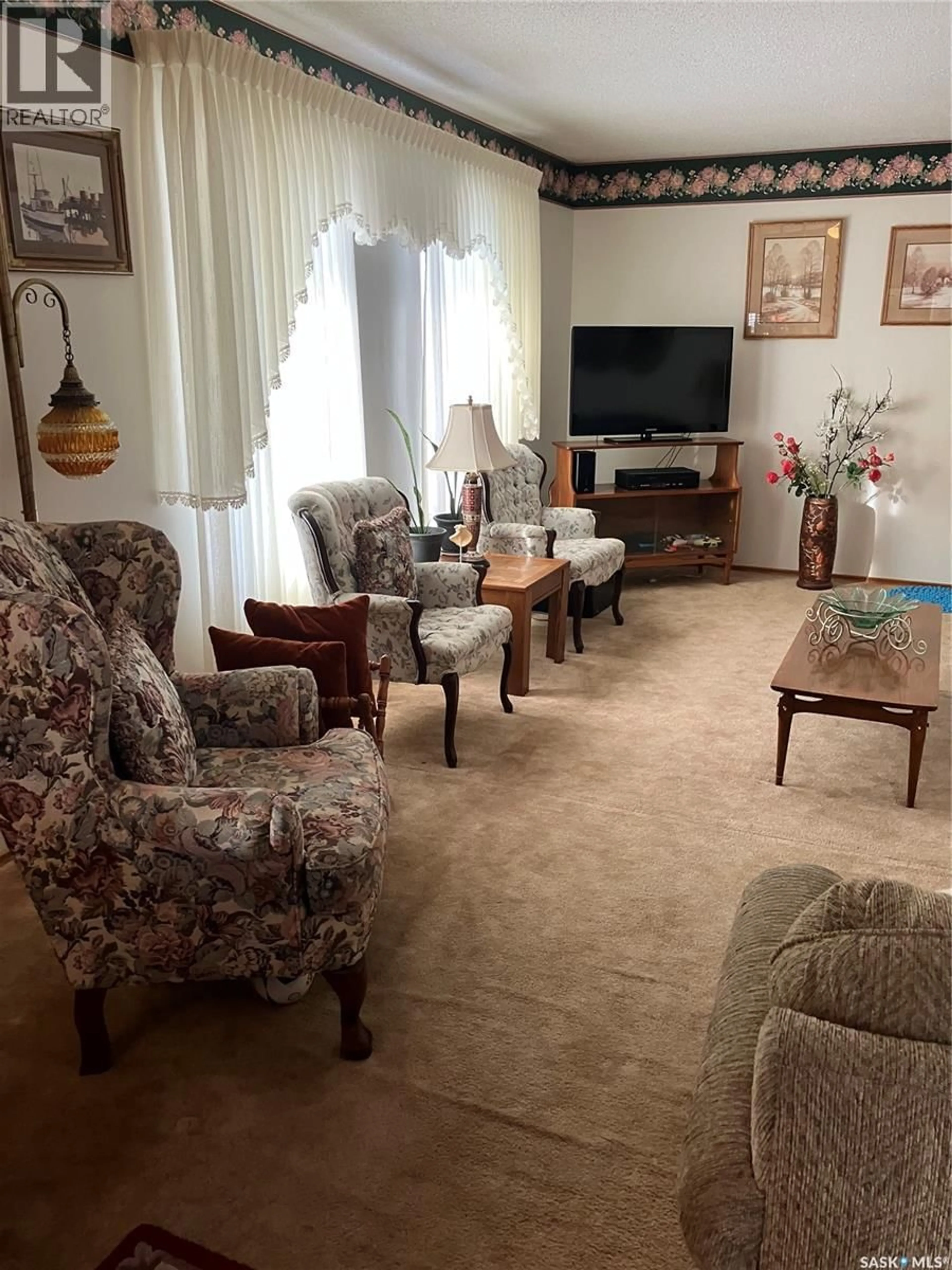 Living room with furniture, unknown for 402 3RD STREET, Ituna Saskatchewan S0A1N0