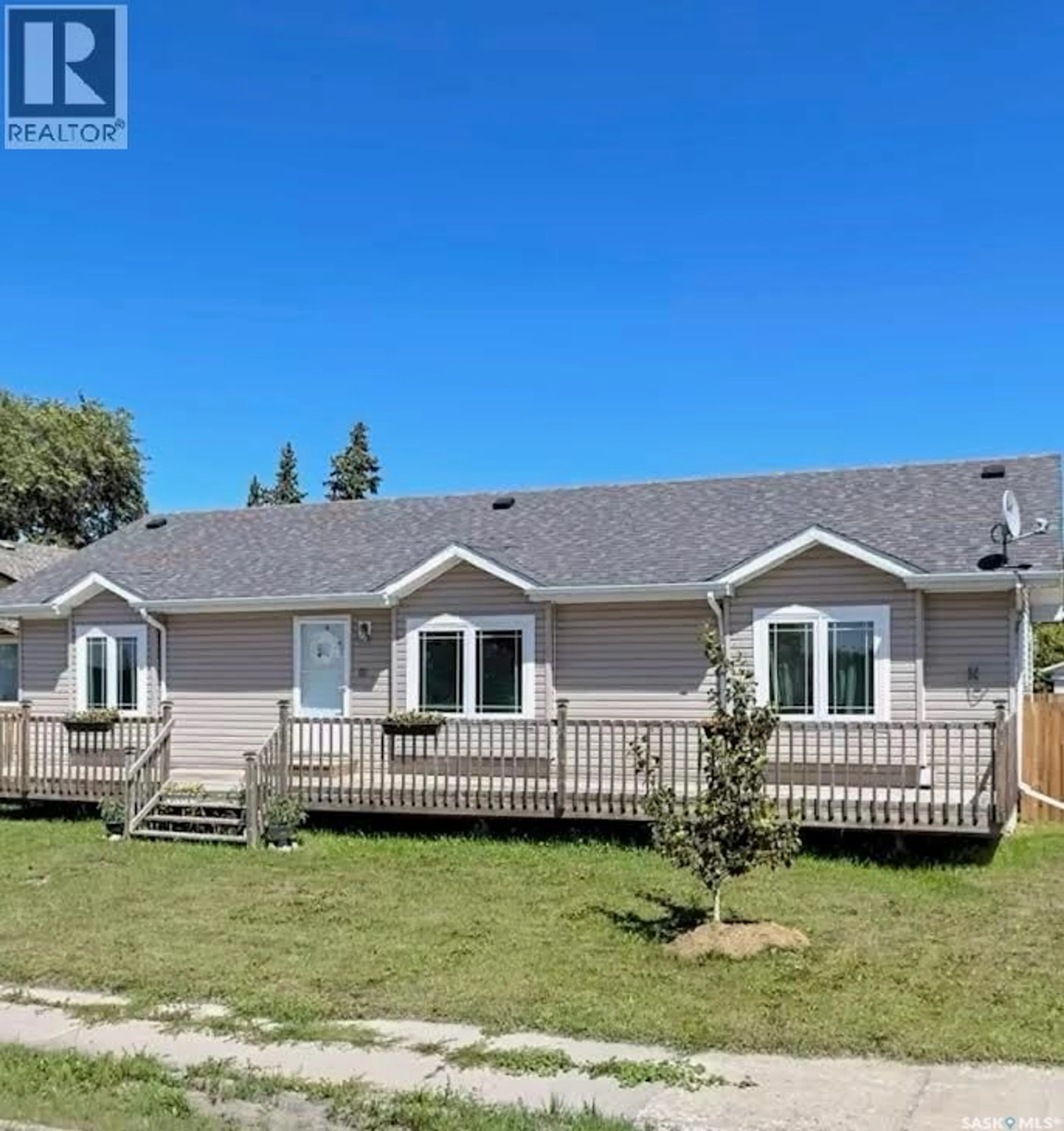 Home with vinyl exterior material, street for 233 HIGH AVENUE, Saltcoats Saskatchewan S0A3R0