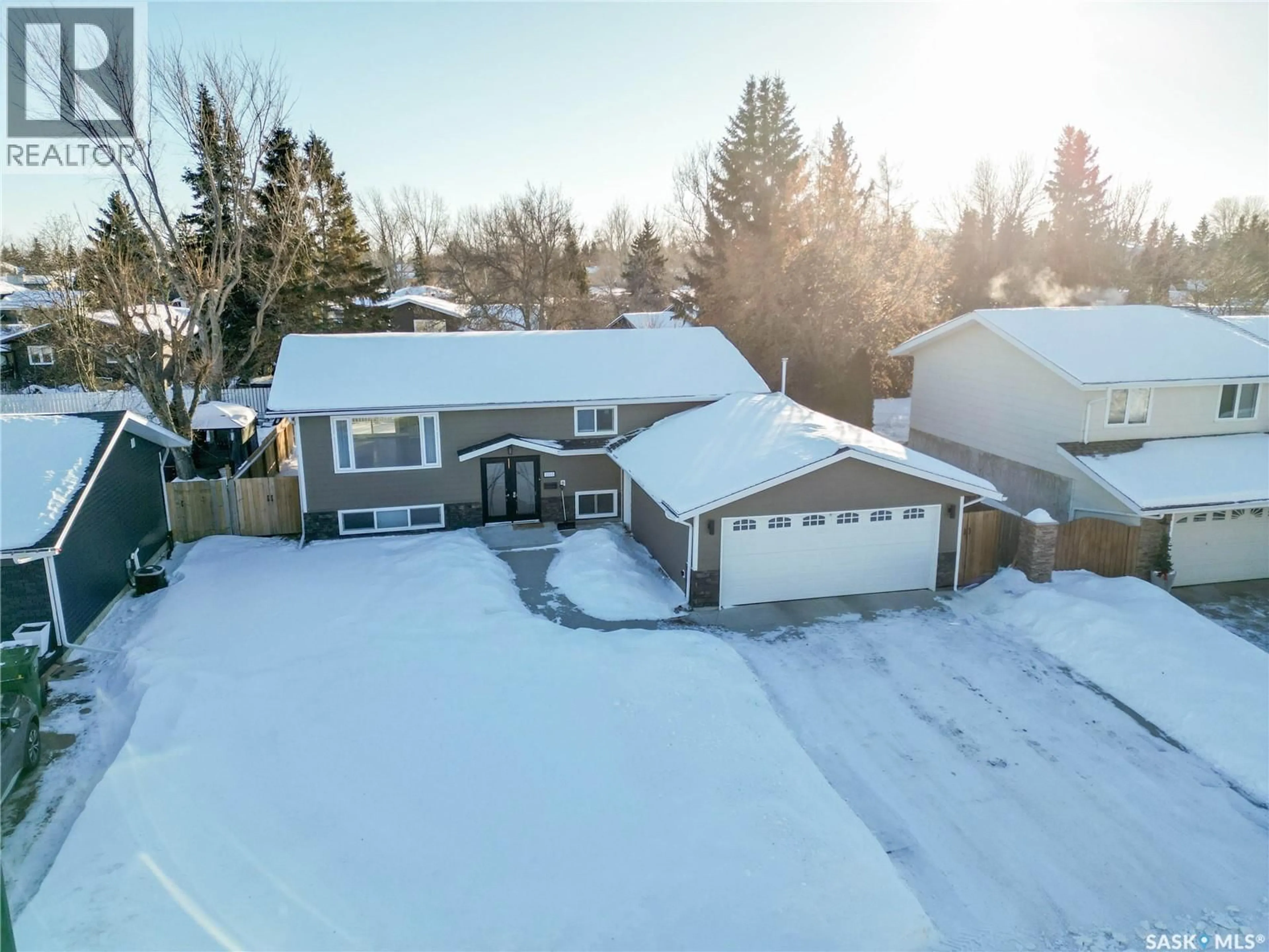 A pic from outside/outdoor area/front of a property/back of a property/a pic from drone, street for 1355 LACROIX CRESCENT, Prince Albert Saskatchewan S6V6R2