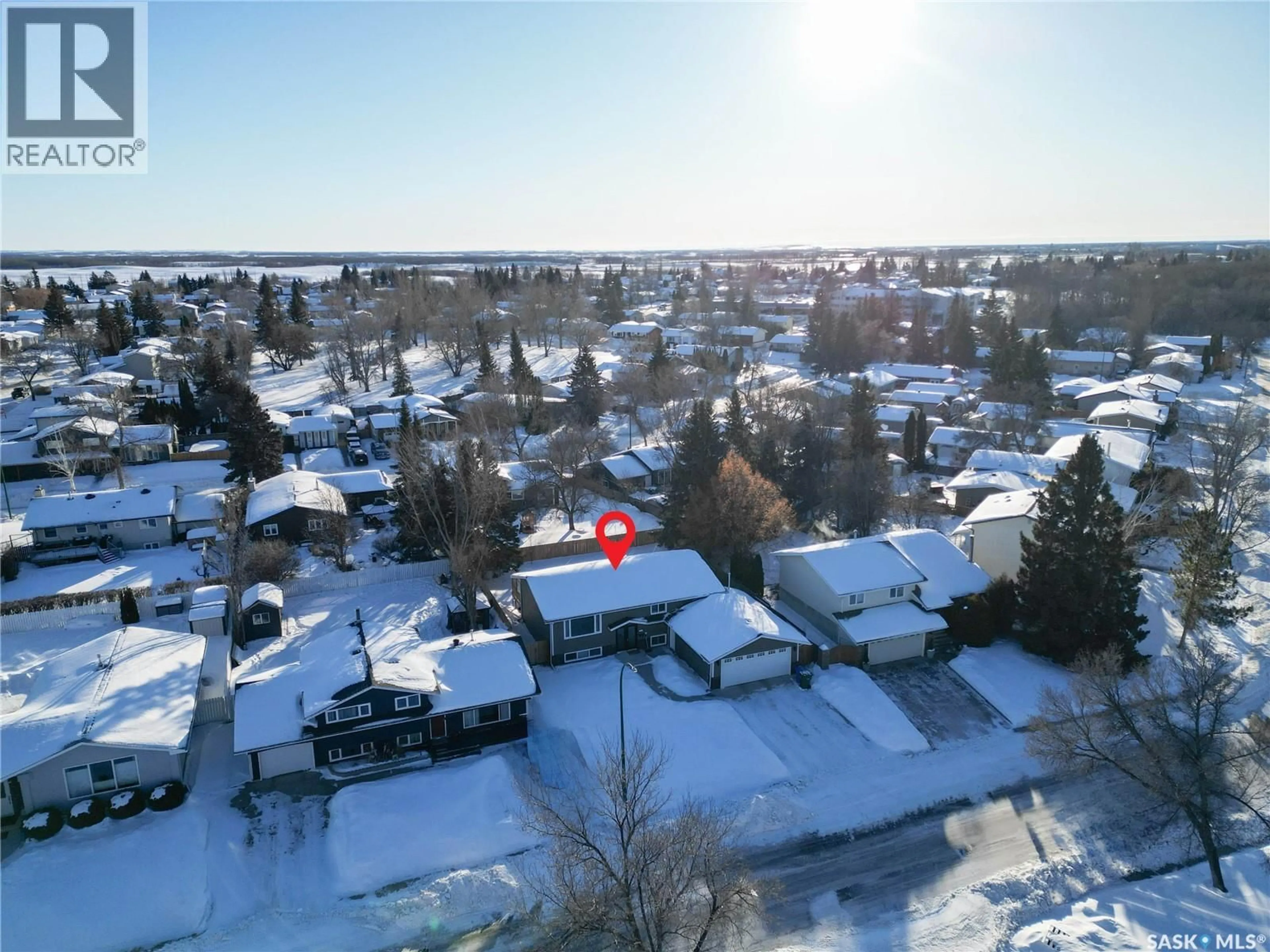 A pic from outside/outdoor area/front of a property/back of a property/a pic from drone, street for 1355 LACROIX CRESCENT, Prince Albert Saskatchewan S6V6R2