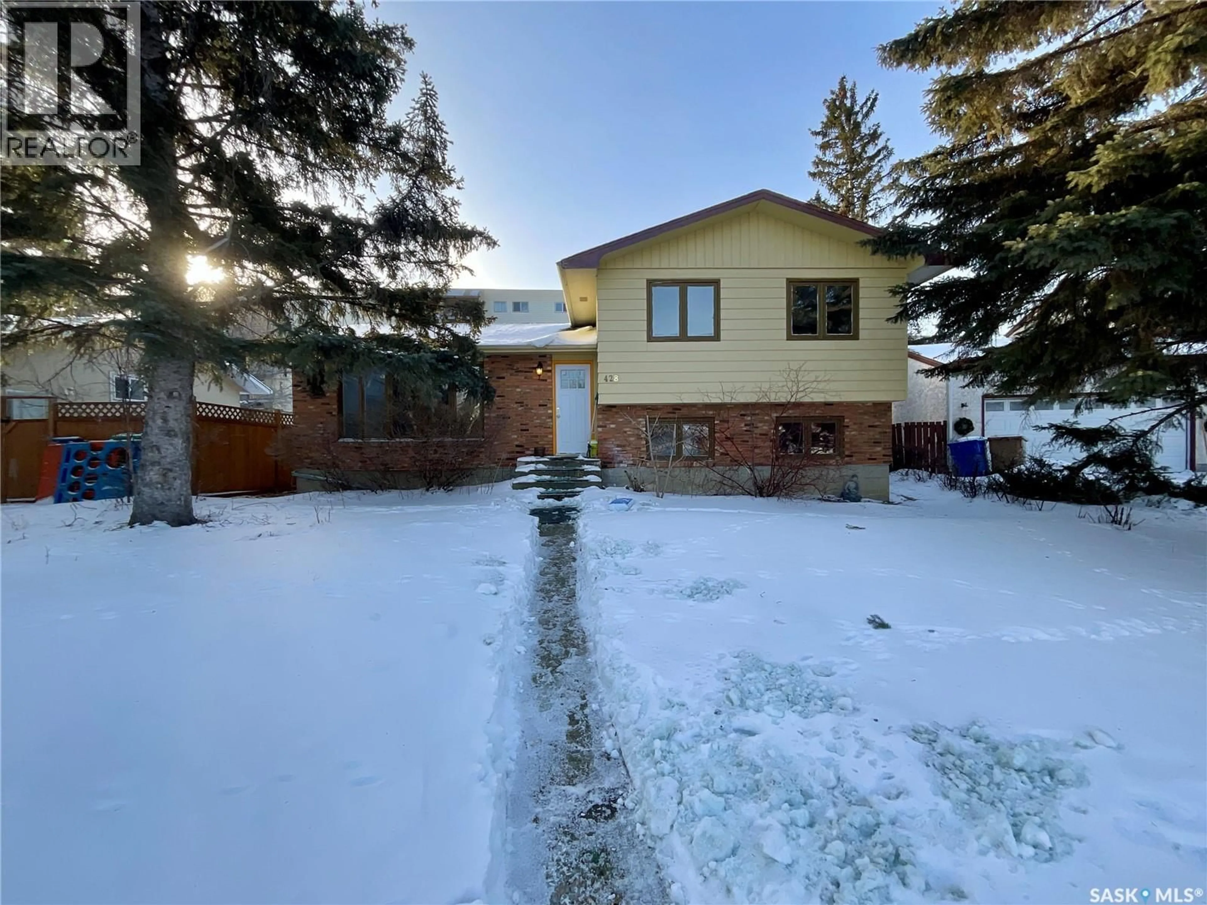 A pic from outside/outdoor area/front of a property/back of a property/a pic from drone, street for 428 HABKIRK DRIVE, Regina Saskatchewan S4S6B1