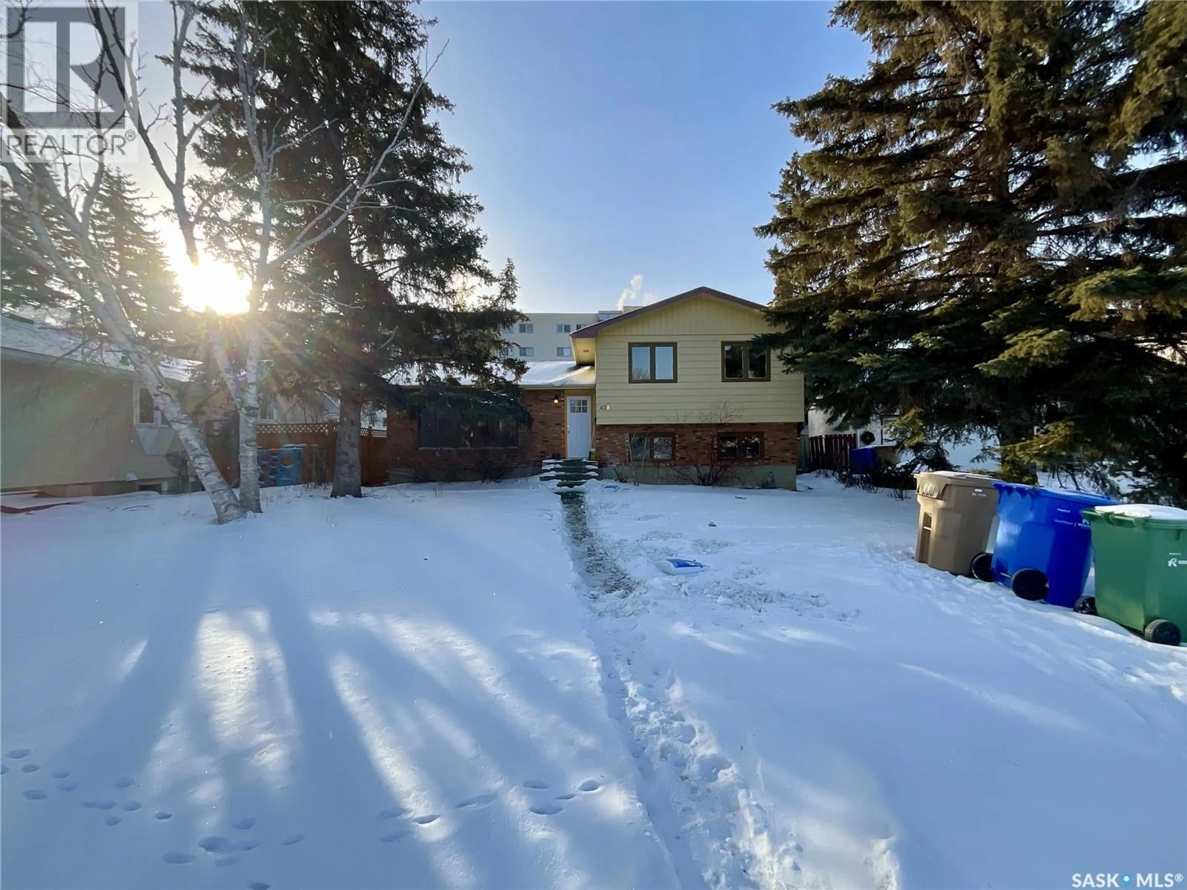 A pic from outside/outdoor area/front of a property/back of a property/a pic from drone, street for 428 HABKIRK DRIVE, Regina Saskatchewan S4S6B1