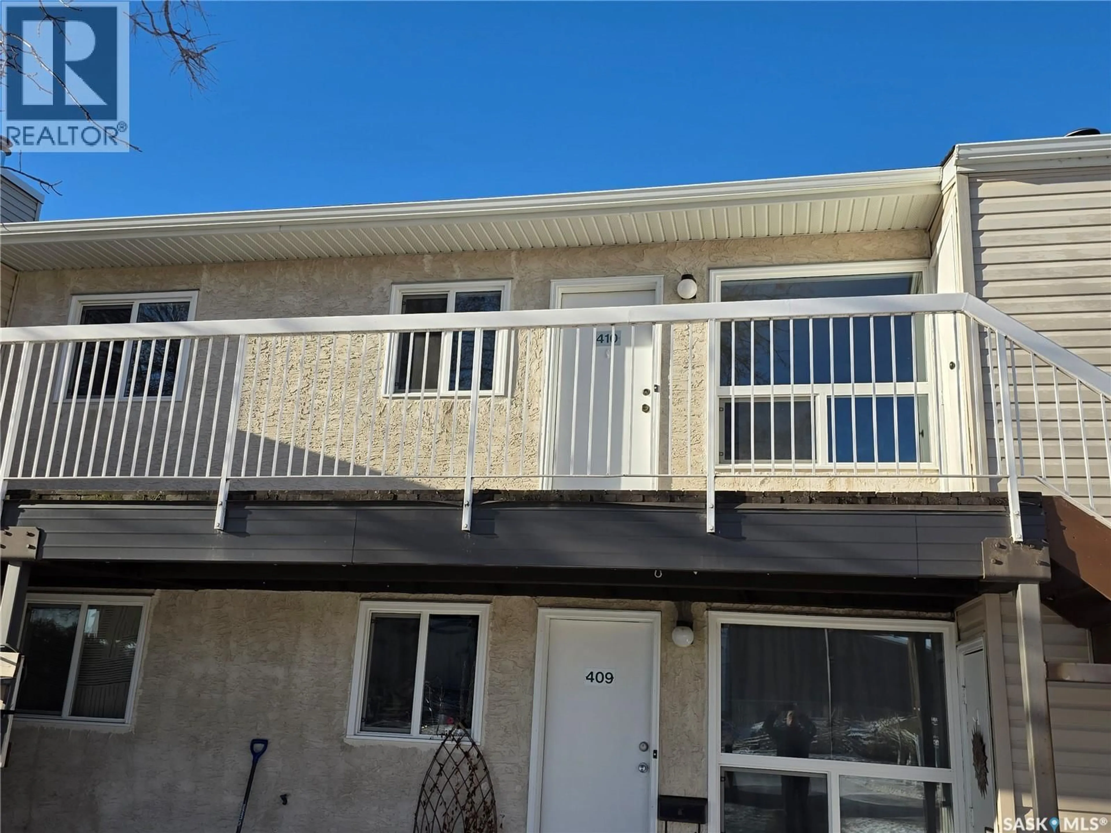 Home with vinyl exterior material, street for 410 67 WOOD LILY DRIVE, Moose Jaw Saskatchewan S6J1G6