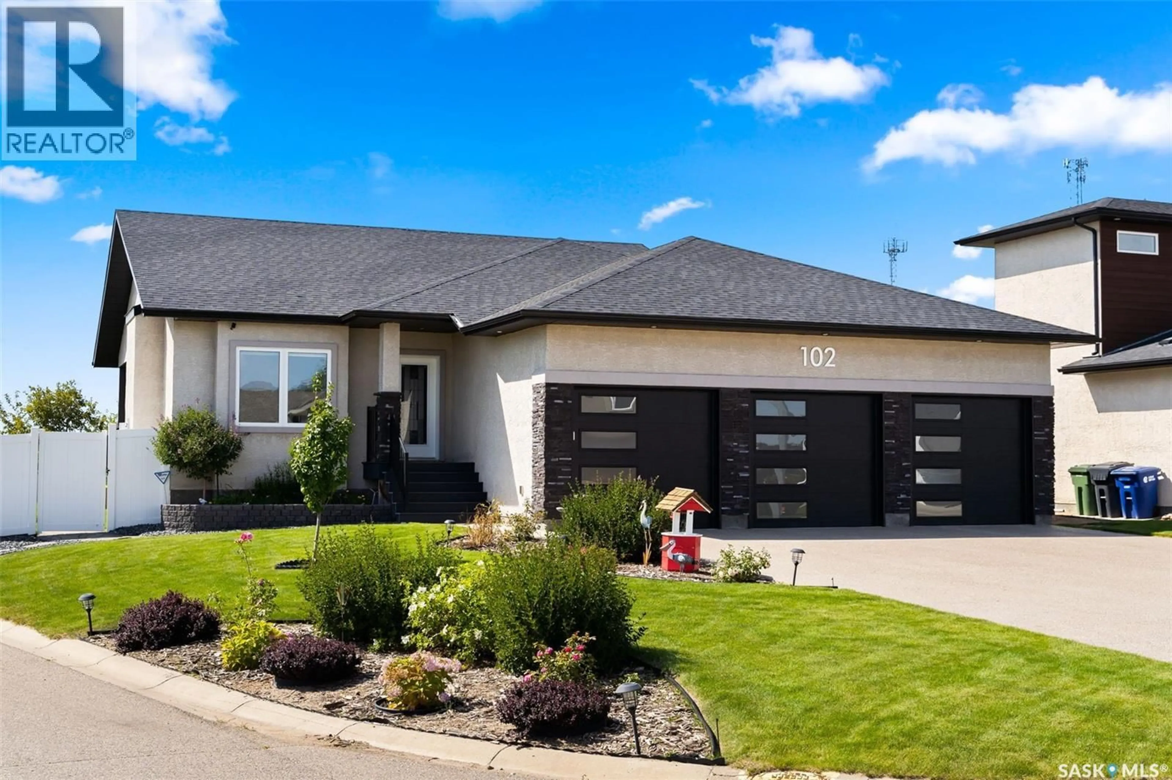 Home with vinyl exterior material, street for 102 PLAINS COURT, Pilot Butte Saskatchewan S0G3Z0