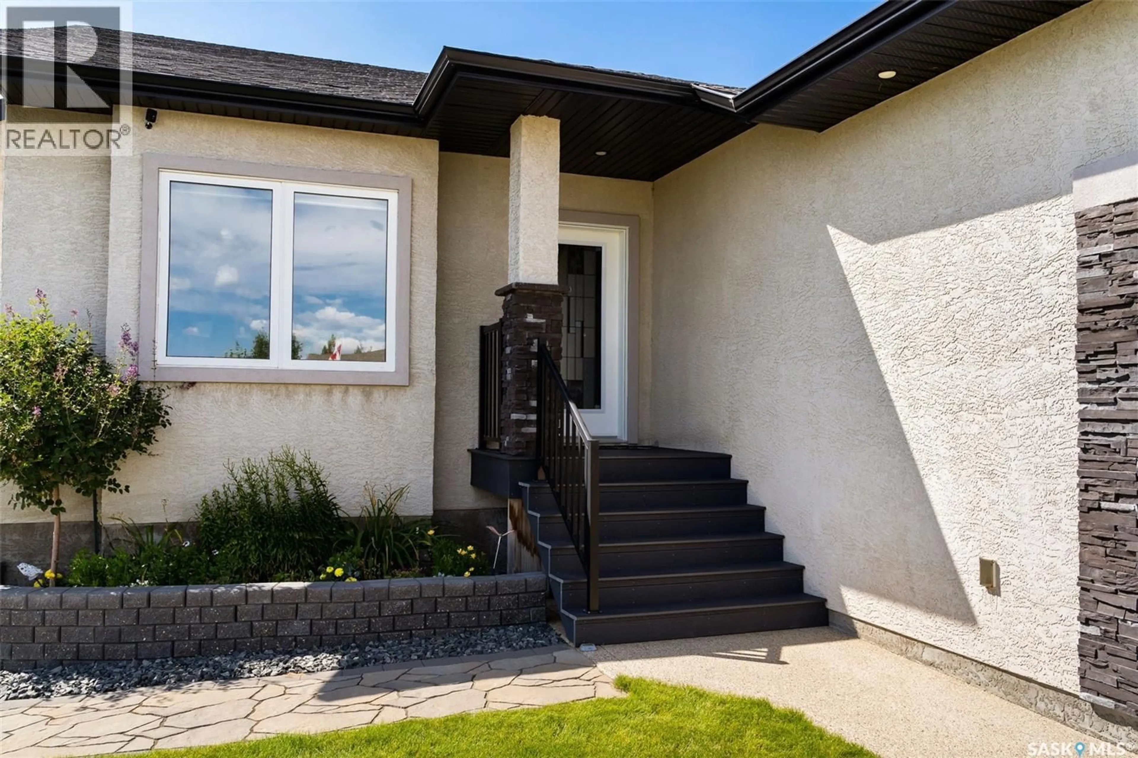 Home with vinyl exterior material, street for 102 PLAINS COURT, Pilot Butte Saskatchewan S0G3Z0