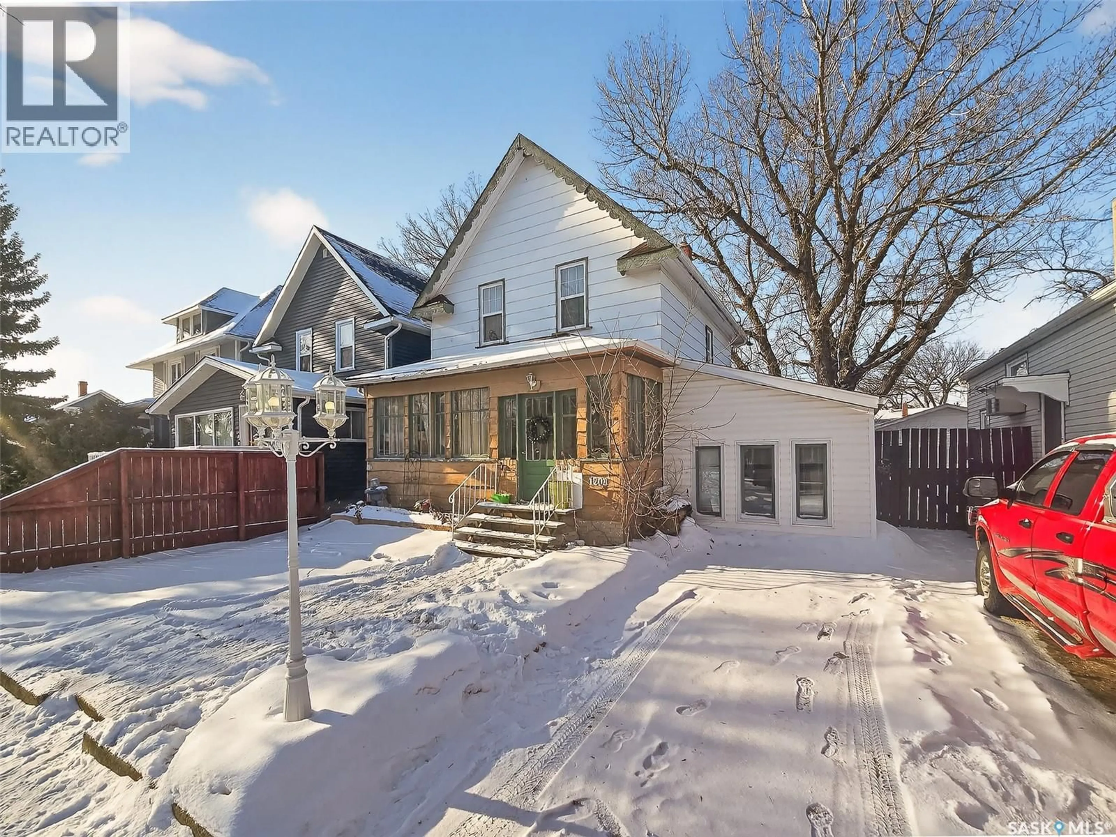 Home with brick exterior material, street for 1208 GRAFTON AVENUE, Moose Jaw Saskatchewan S6H3S6