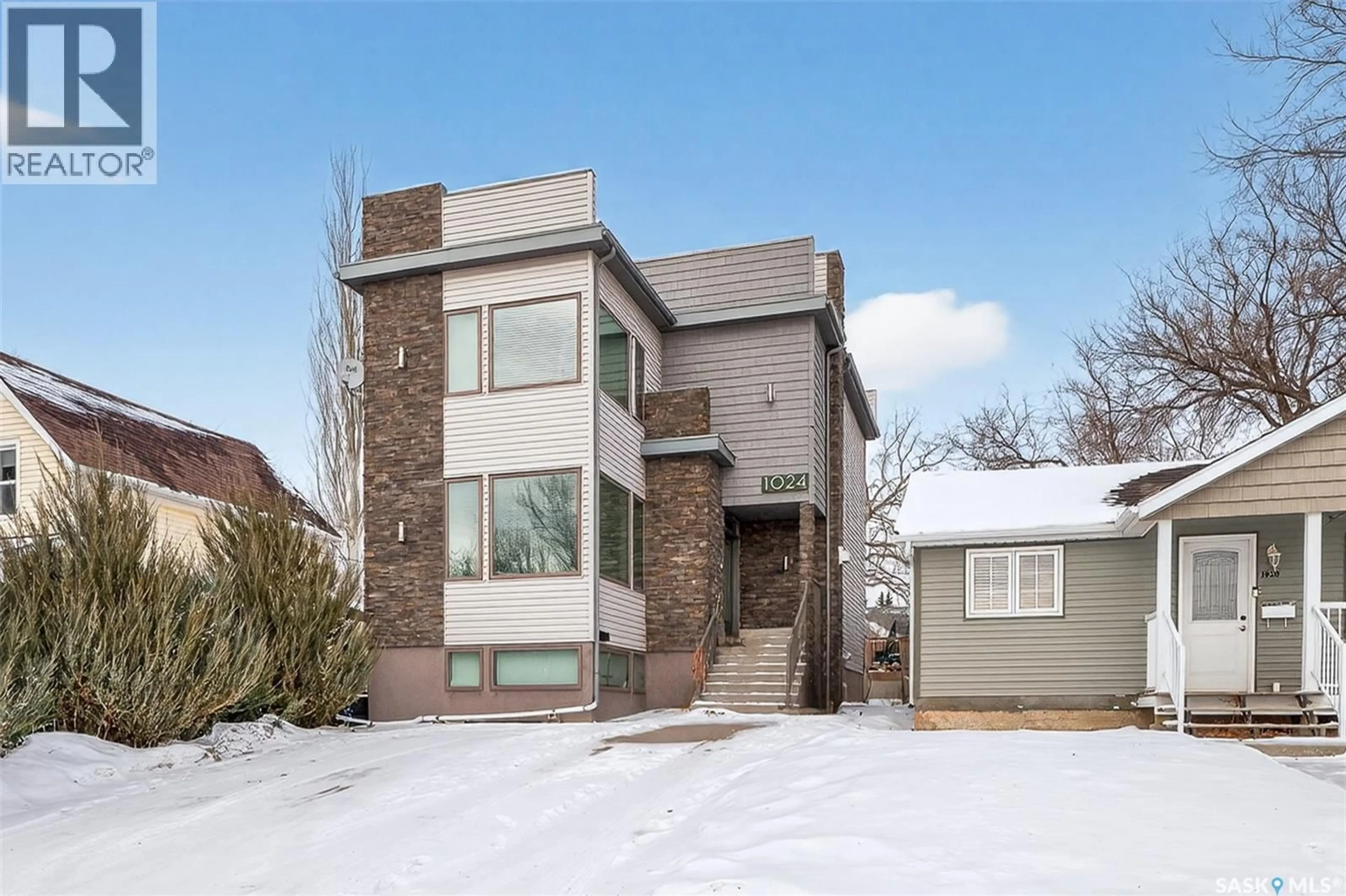 Home with brick exterior material, street for 1024 HOCHELAGA STREET, Moose Jaw Saskatchewan S6H2H9