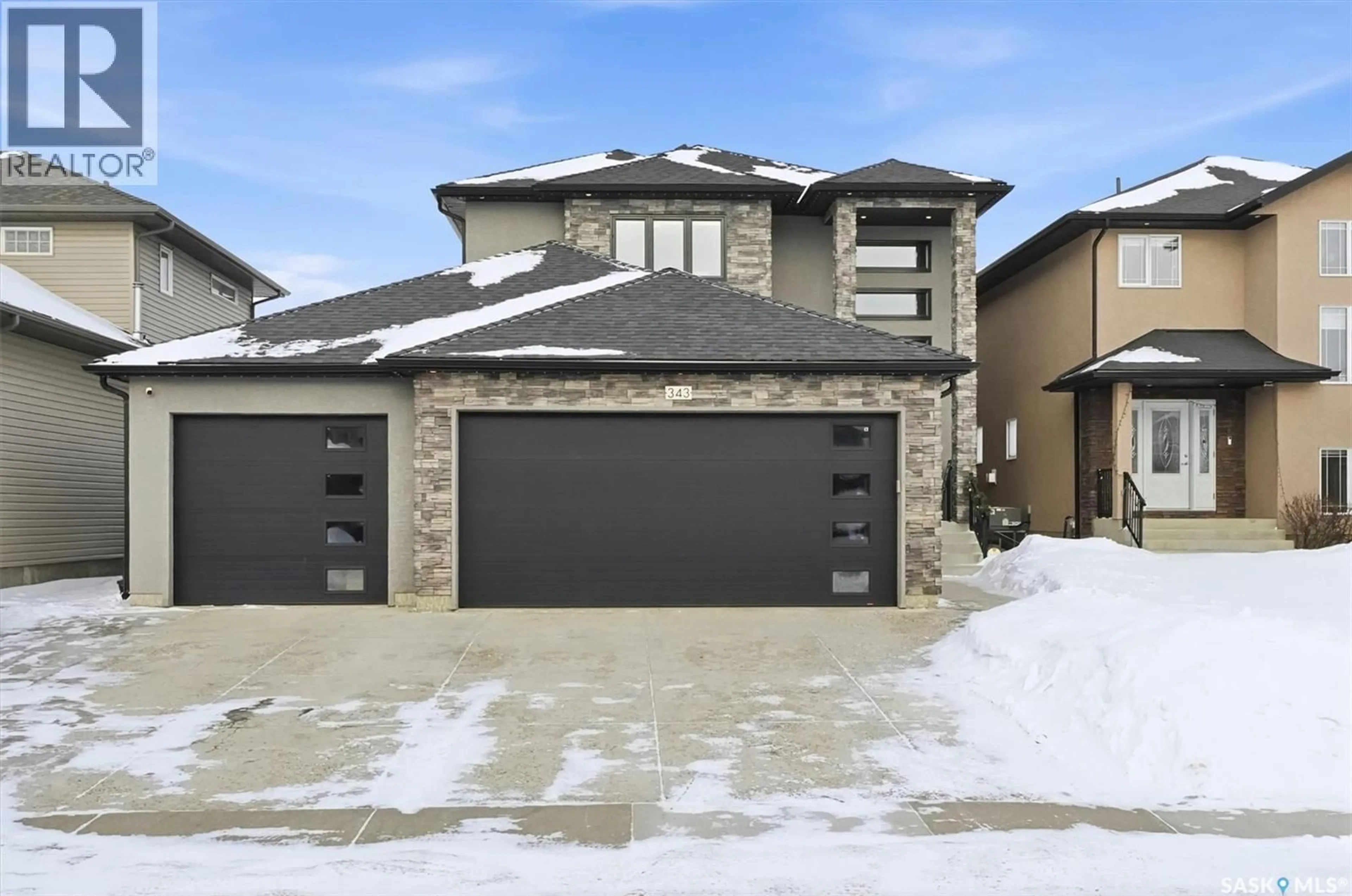 Home with brick exterior material, street for 343 MAHABIR COURT, Saskatoon Saskatchewan S7W0J5