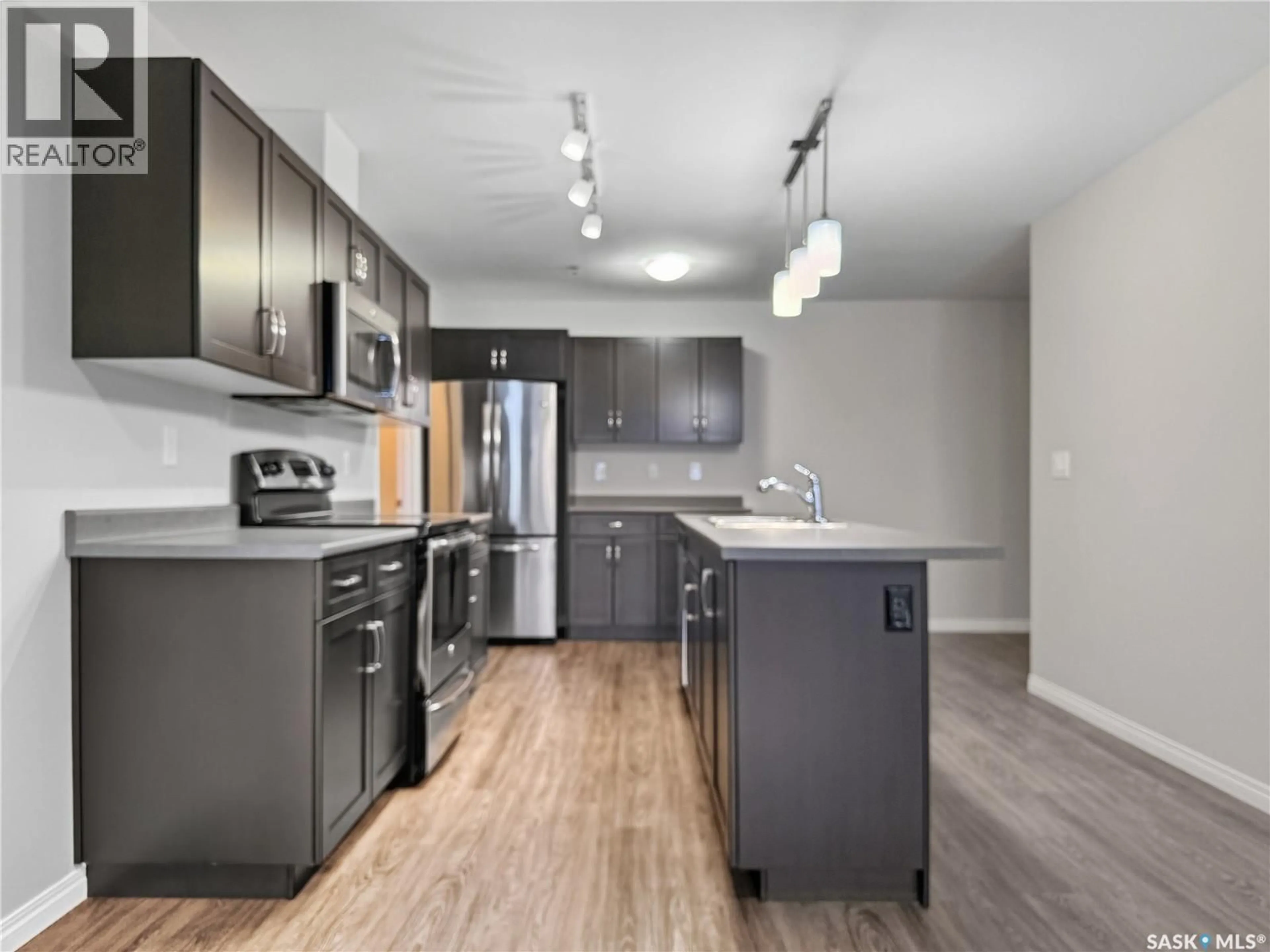 Open concept kitchen, unknown for 309 - 2452 KILLDEER DRIVE, North Battleford Saskatchewan S9A3T5