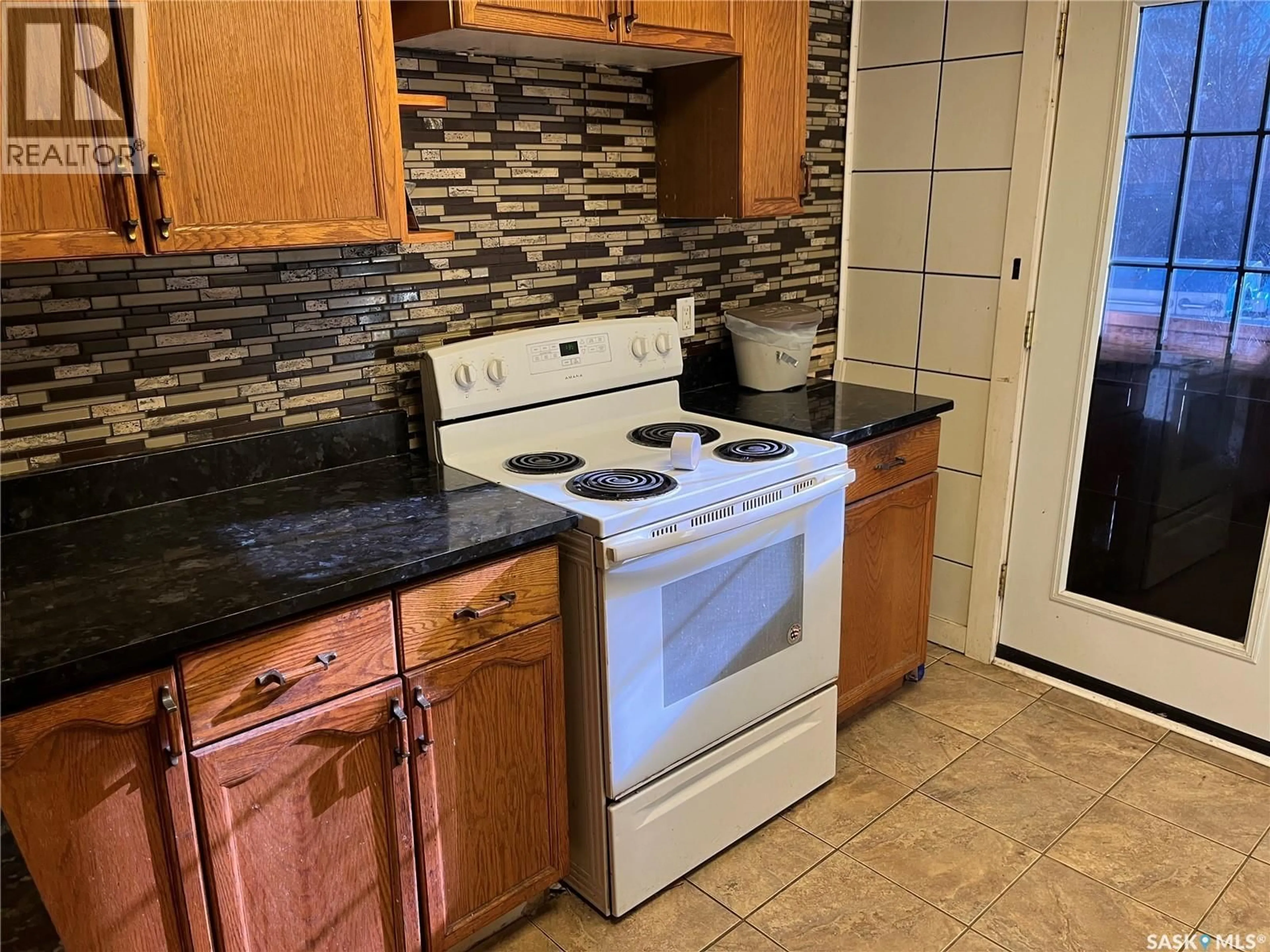 Standard kitchen, ceramic/tile floor for 5009 8TH AVENUE, Regina Saskatchewan S4T0W4