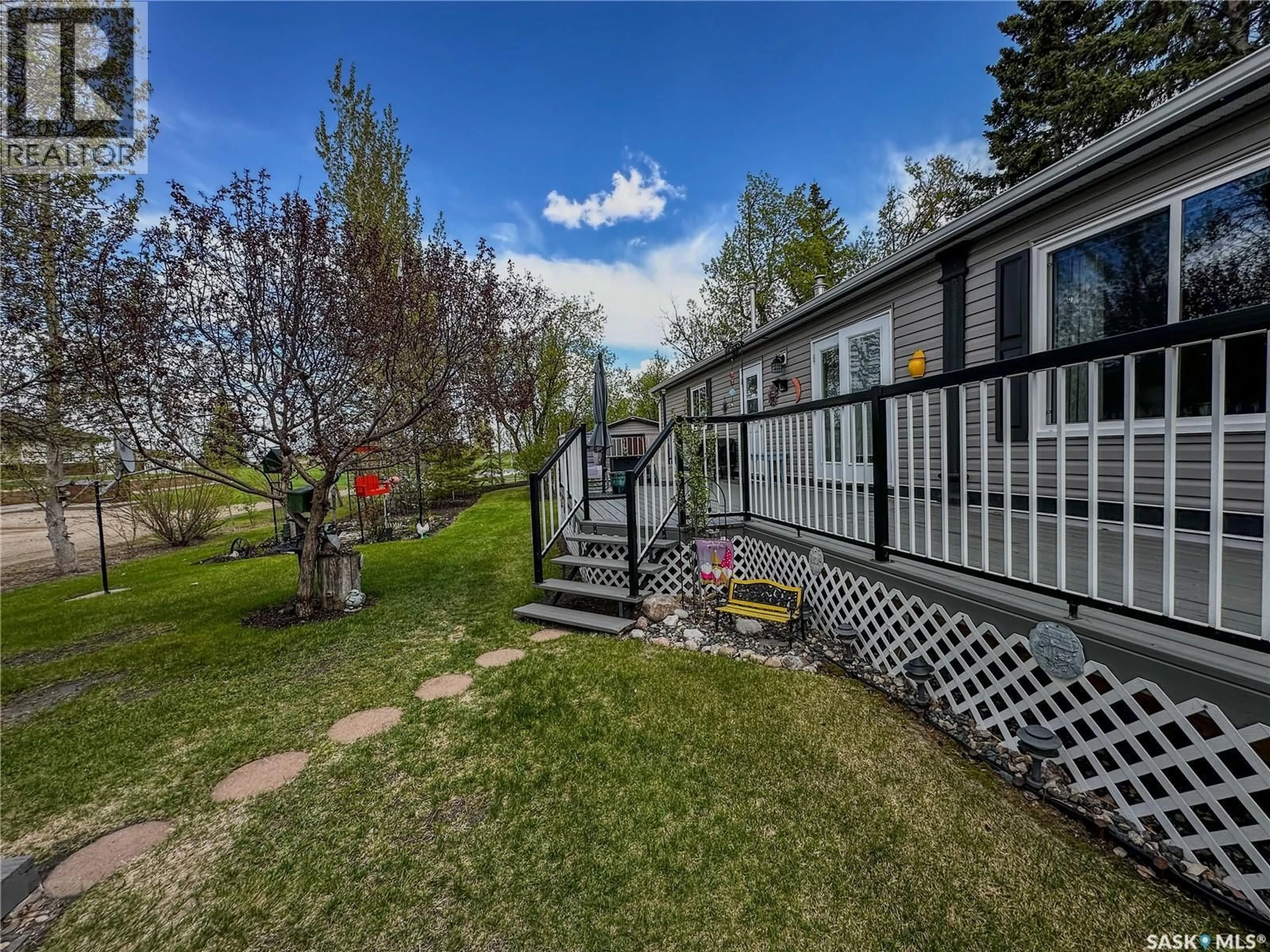 A pic from outside/outdoor area/front of a property/back of a property/a pic from drone, mountain view for 107 MAY STREET, Neudorf Saskatchewan S0A2T0