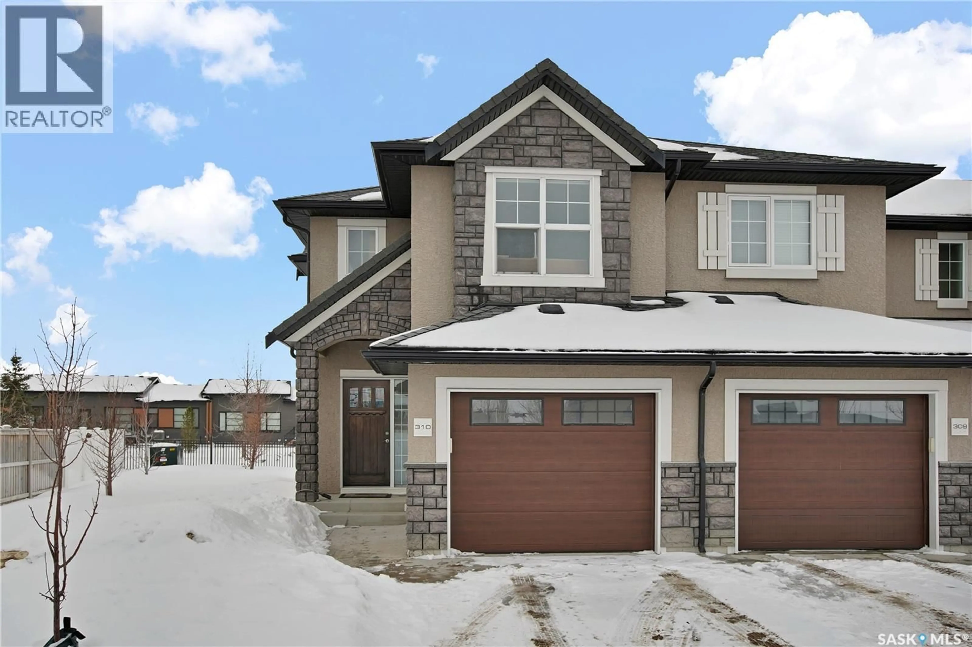 Home with brick exterior material, street for 310 2007 POHORECKY CRESCENT, Saskatoon Saskatchewan S7W0V4