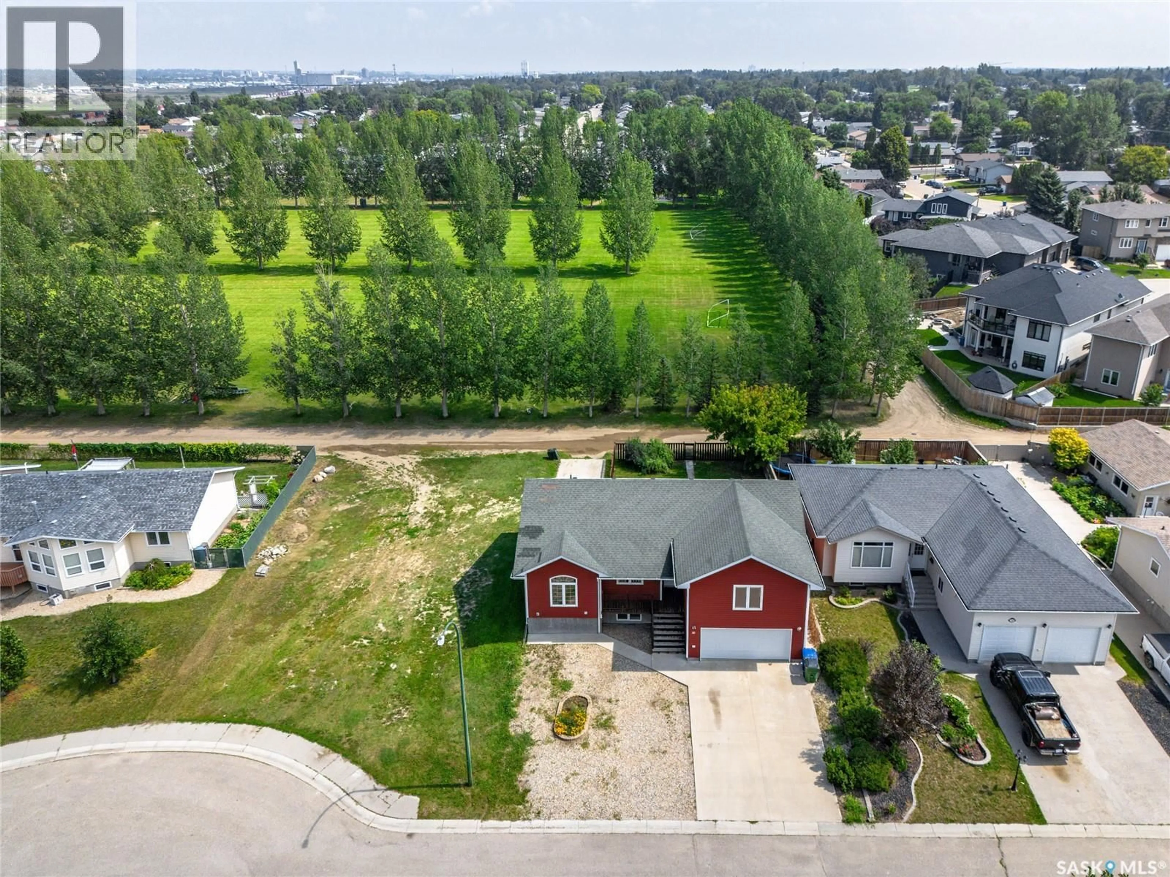A pic from outside/outdoor area/front of a property/back of a property/a pic from drone, water/lake/river/ocean view for 30 CARRINGTON DRIVE, Moose Jaw Saskatchewan S6K1C2