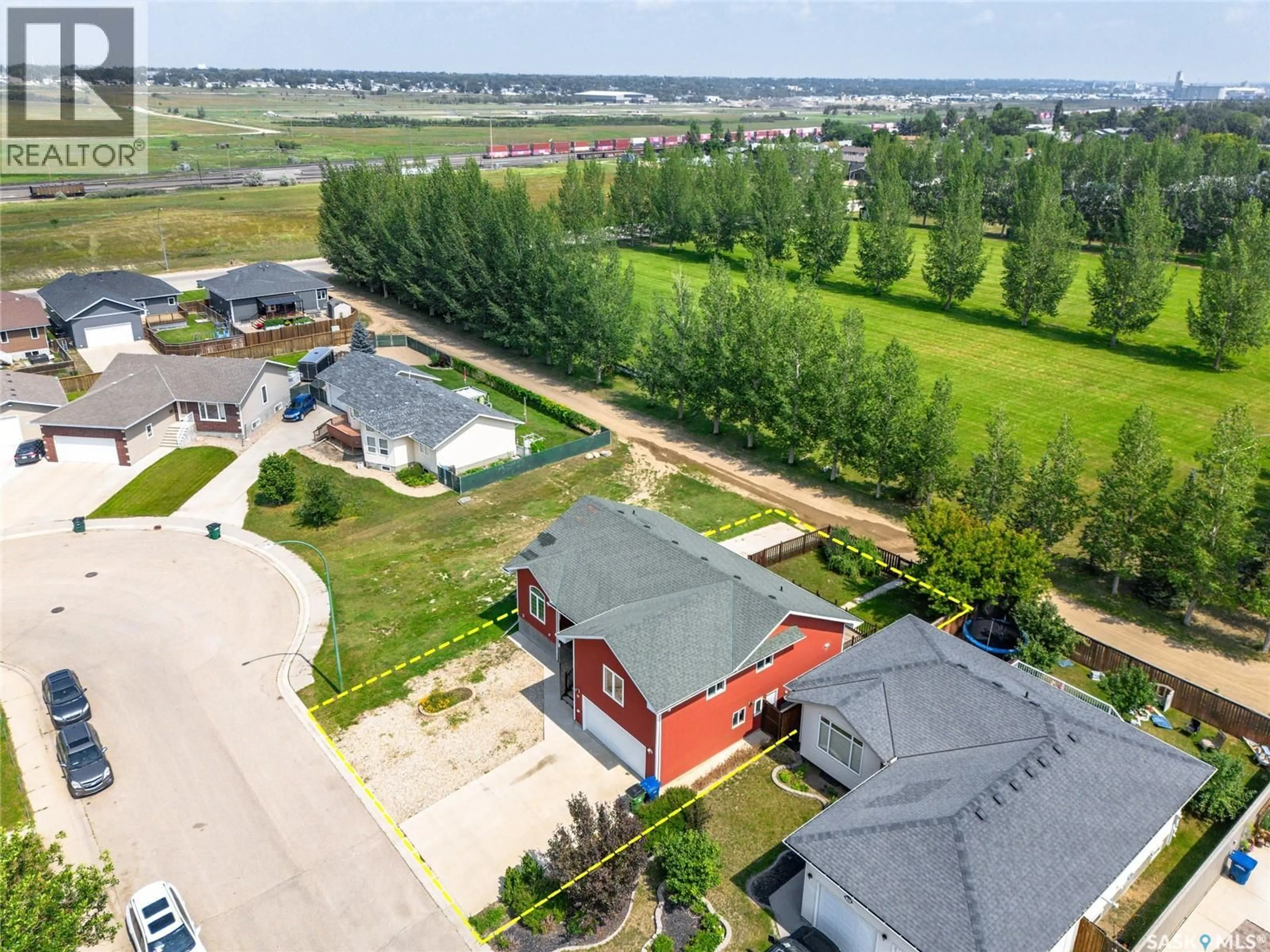 A pic from outside/outdoor area/front of a property/back of a property/a pic from drone, water/lake/river/ocean view for 30 CARRINGTON DRIVE, Moose Jaw Saskatchewan S6K1C2