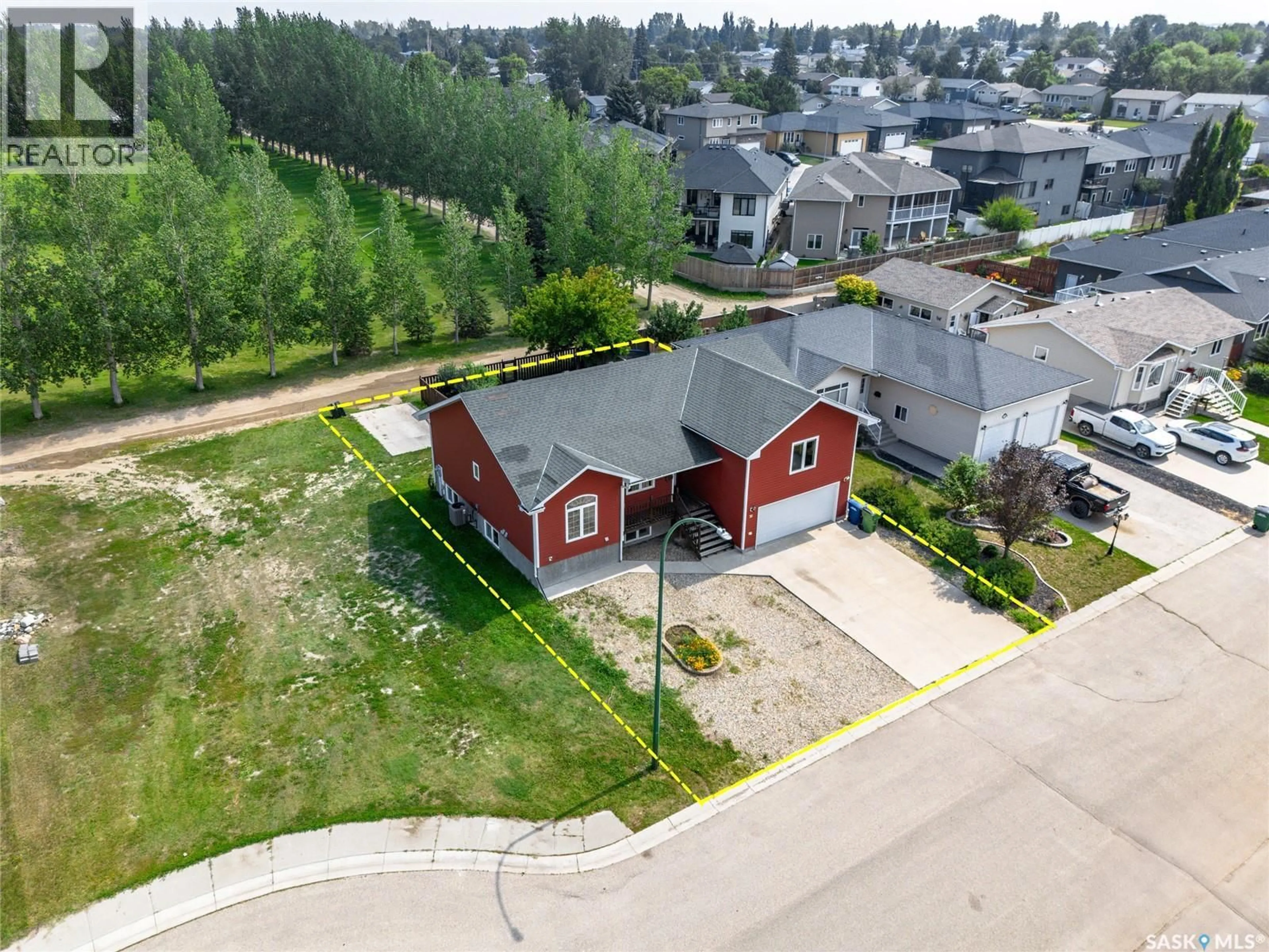 A pic from outside/outdoor area/front of a property/back of a property/a pic from drone, street for 30 CARRINGTON DRIVE, Moose Jaw Saskatchewan S6K1C2