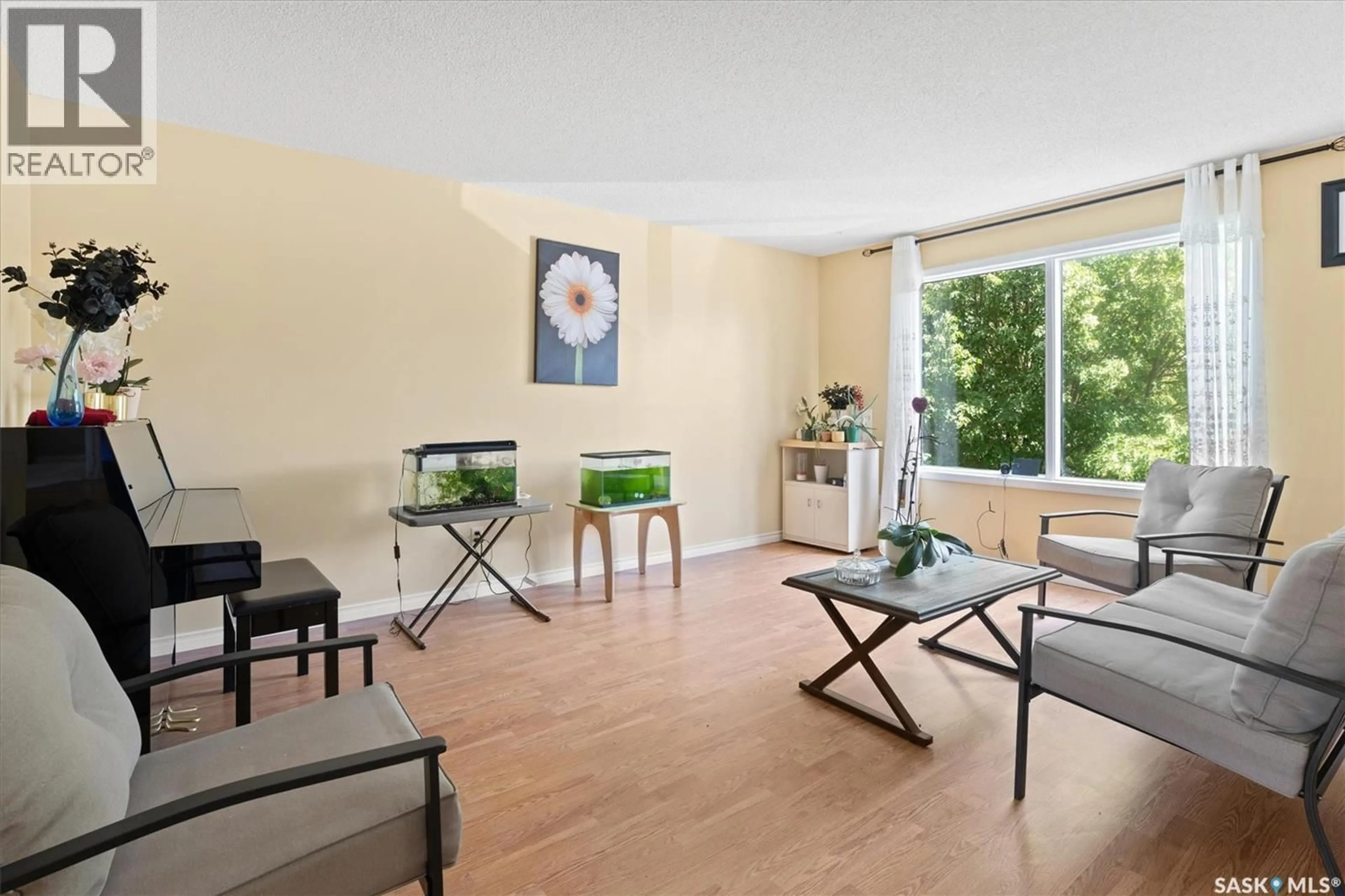 Living room with furniture, unknown for 107 - 610 PEREHUDOFF CRESCENT, Saskatoon Saskatchewan S7N4H5