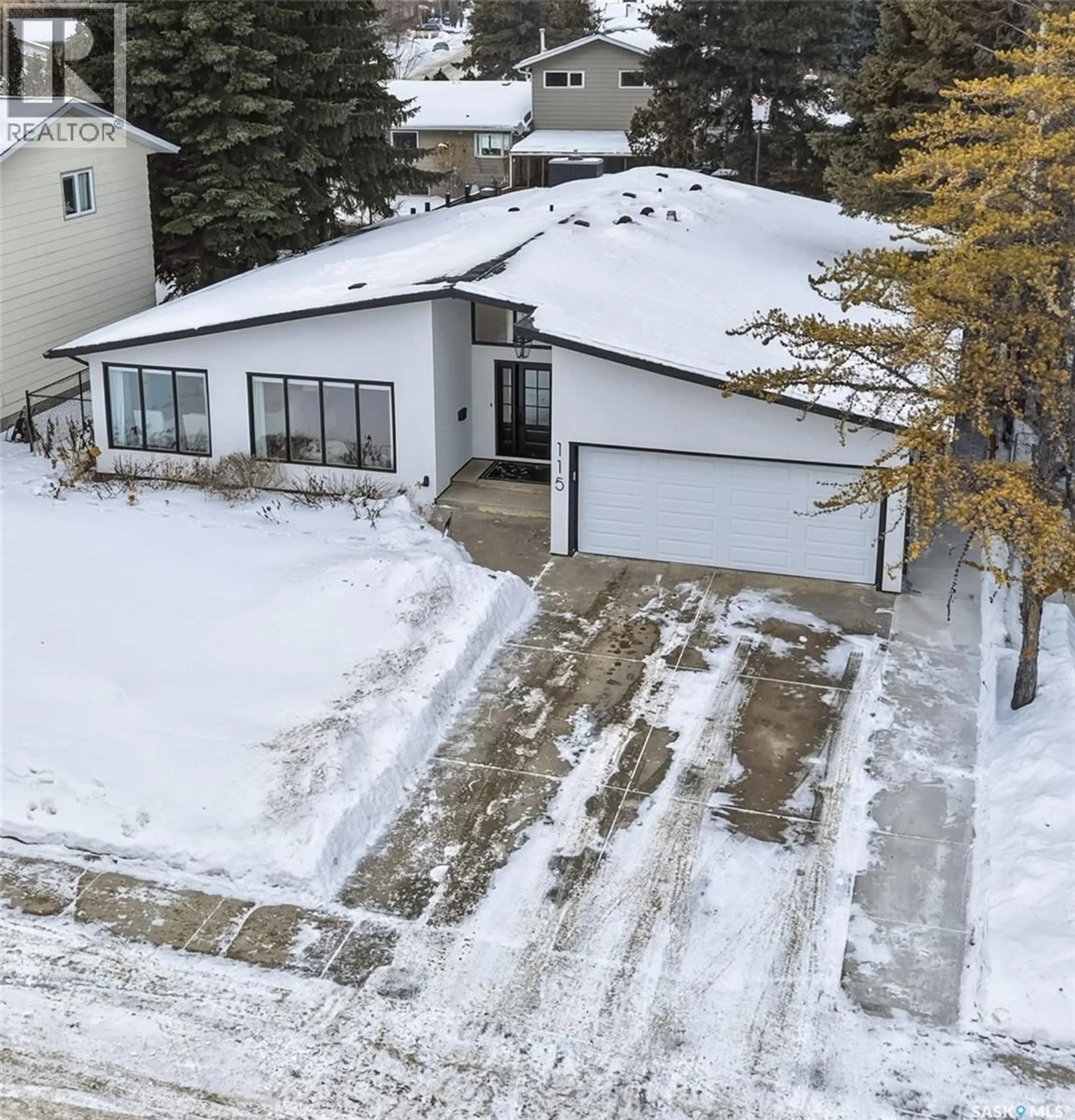 A pic from outside/outdoor area/front of a property/back of a property/a pic from drone, street for 115 WHITESWAN DRIVE, Saskatoon Saskatchewan S7K4M5