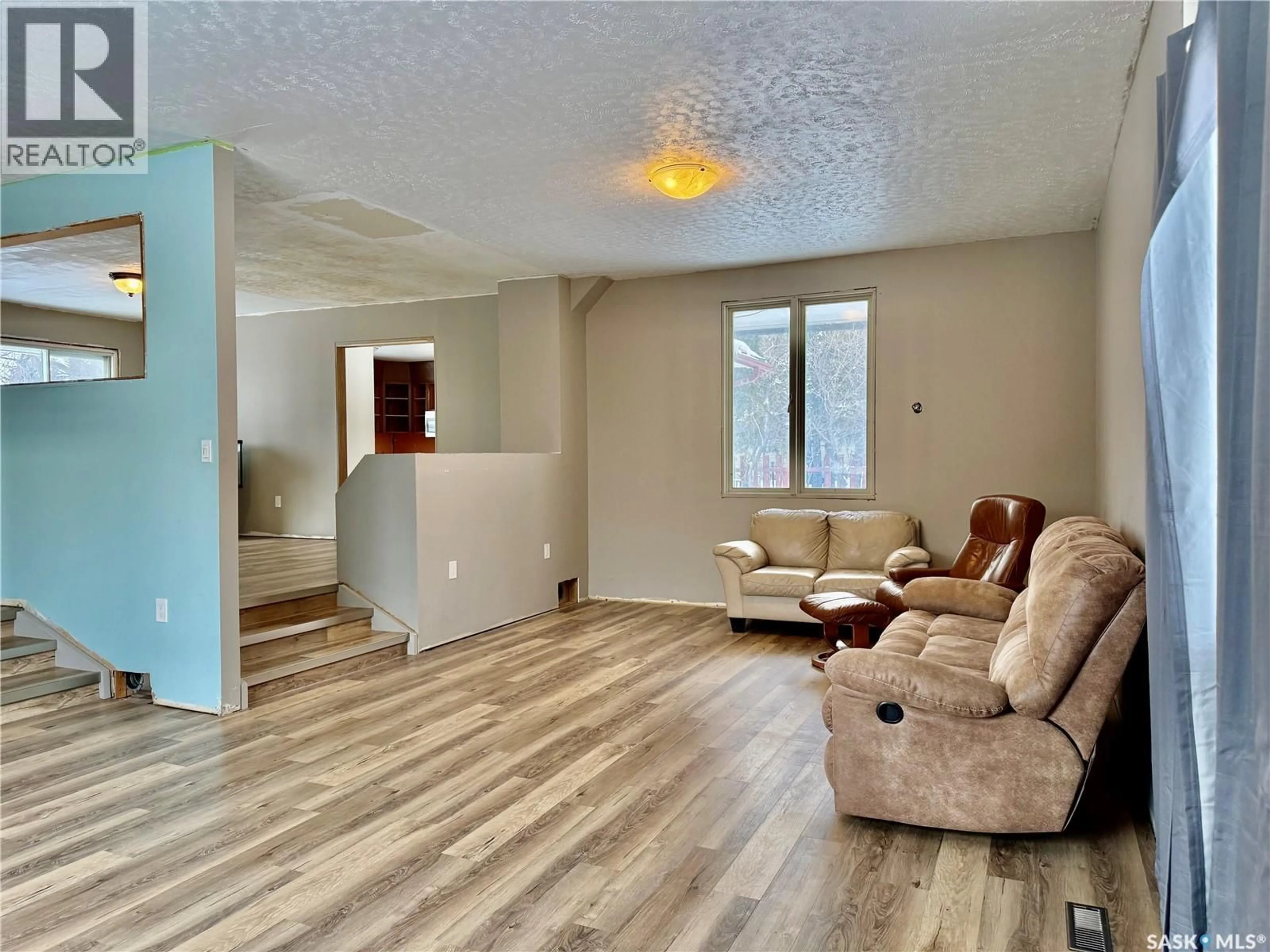 Living room with furniture, unknown for 15 WILLOW PLACE, Lanigan Saskatchewan S0K2M0