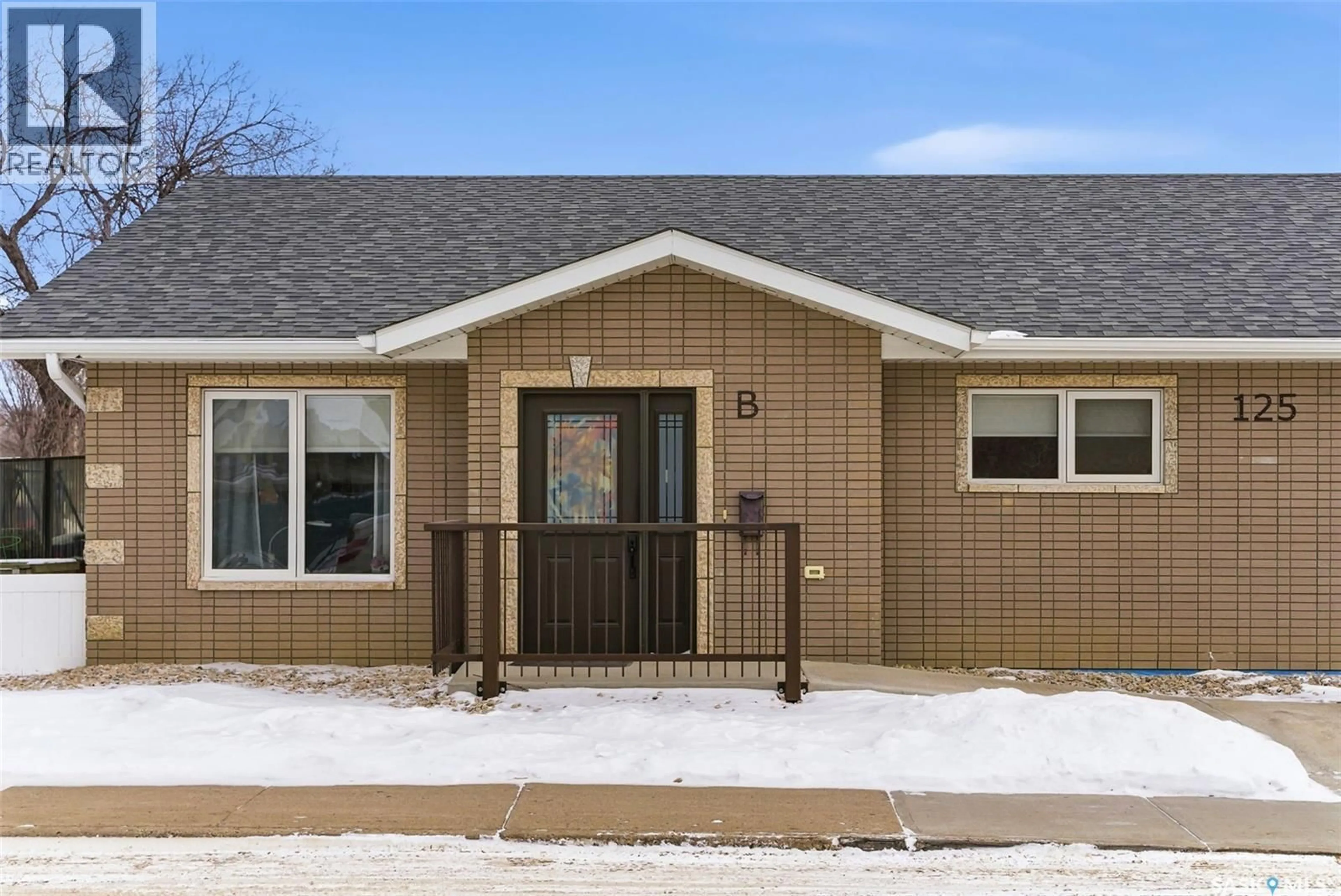 Home with vinyl exterior material, street for A&B - 125 2ND AVENUE, Moose Jaw Saskatchewan S6H2A2