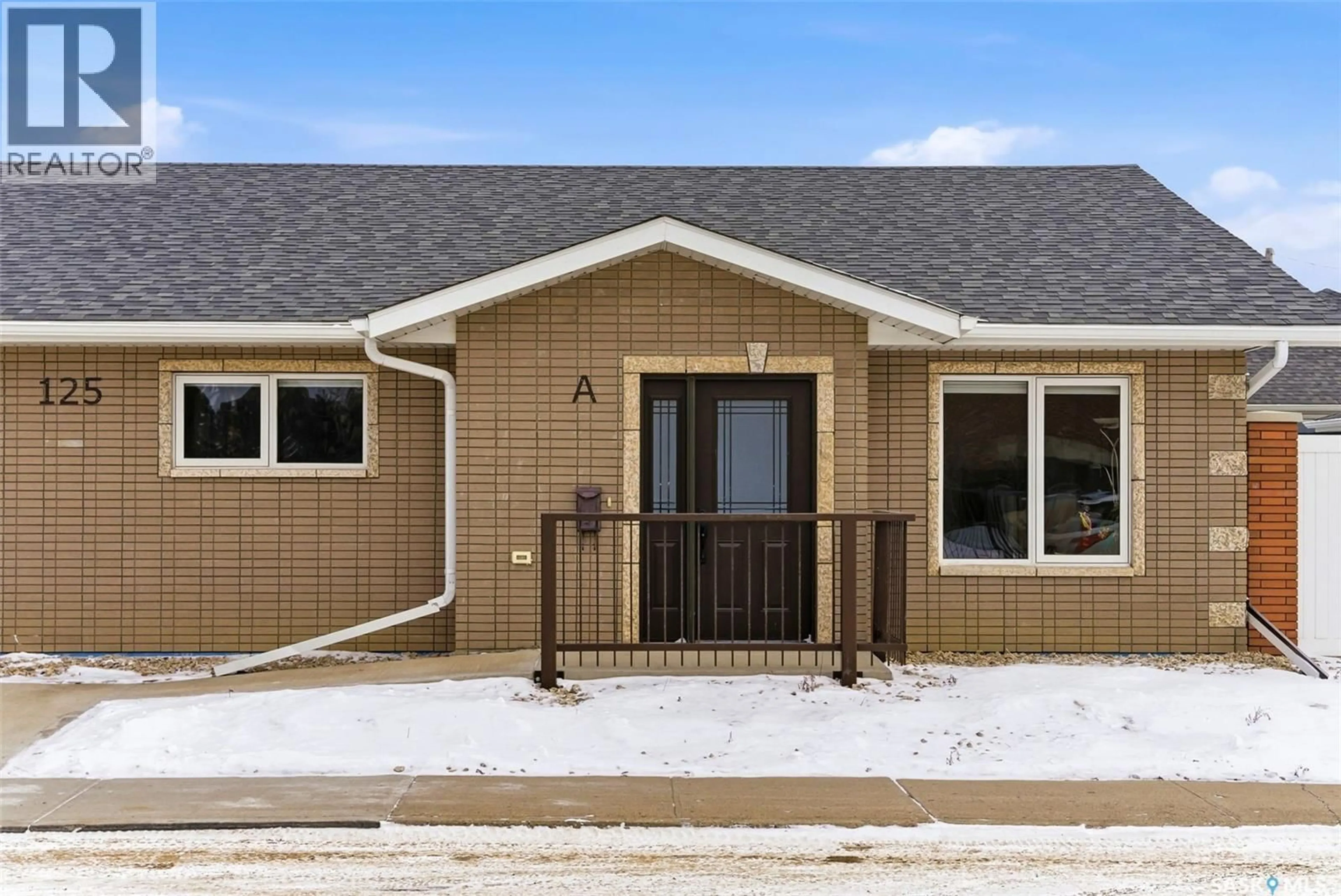 Home with vinyl exterior material, street for A&B - 125 2ND AVENUE, Moose Jaw Saskatchewan S6H2A2
