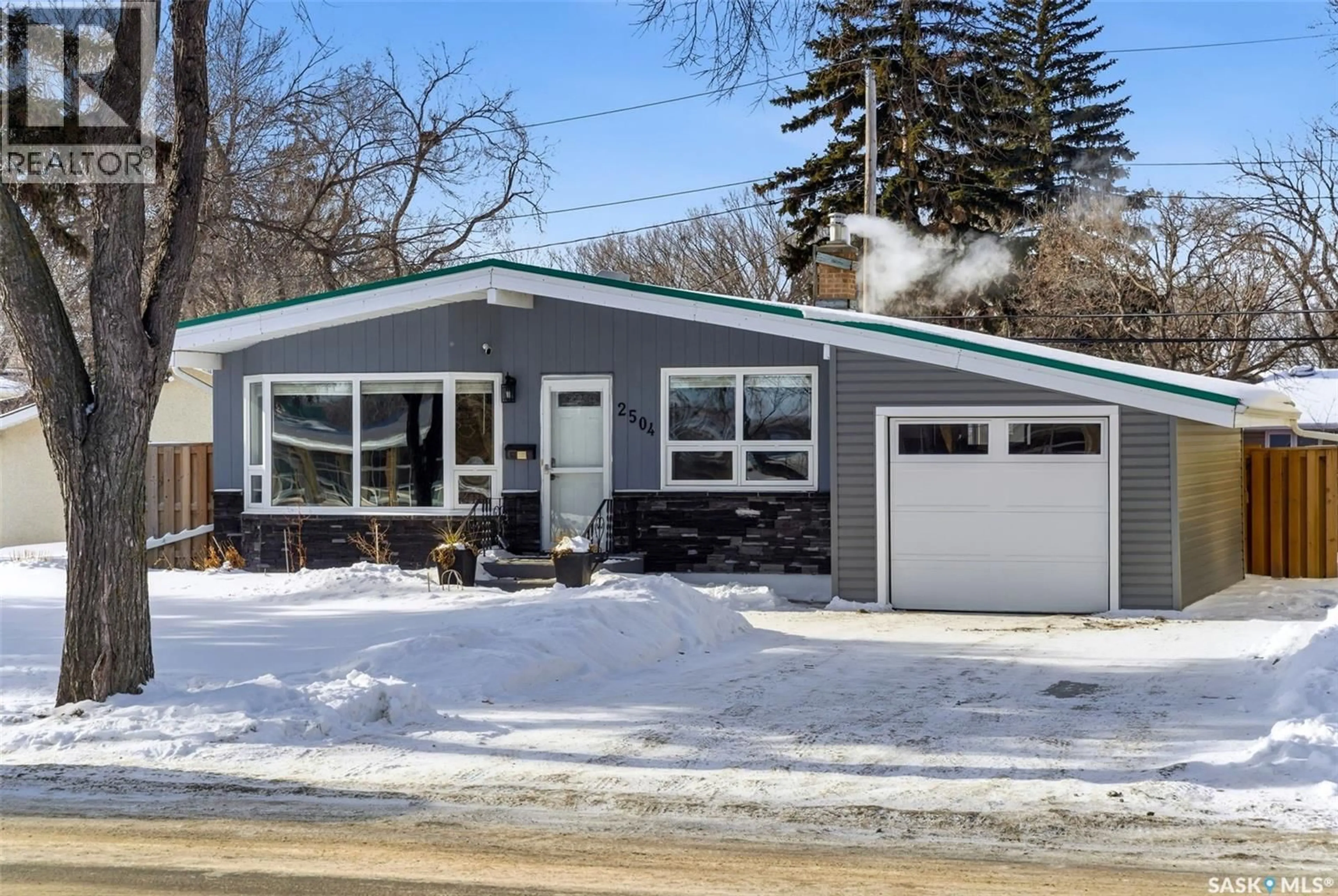 Home with vinyl exterior material, street for 2504 GRANT ROAD, Regina Saskatchewan S4S5E6