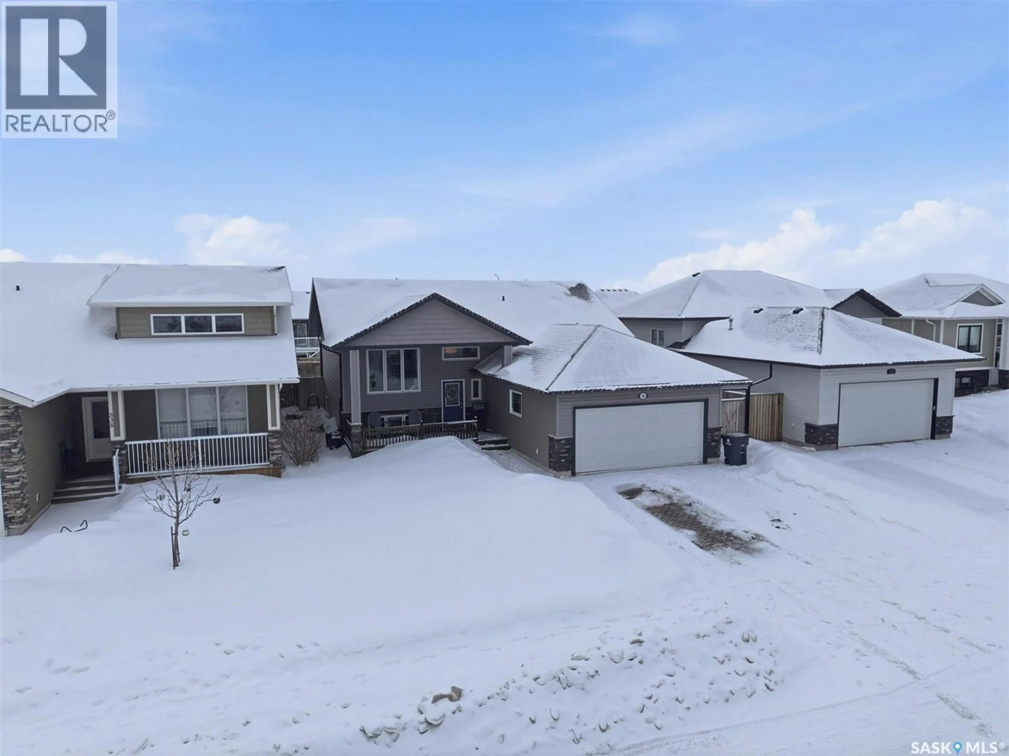 A pic from outside/outdoor area/front of a property/back of a property/a pic from drone, street for 536 PALMER CRESCENT, Warman Saskatchewan S0K4S1