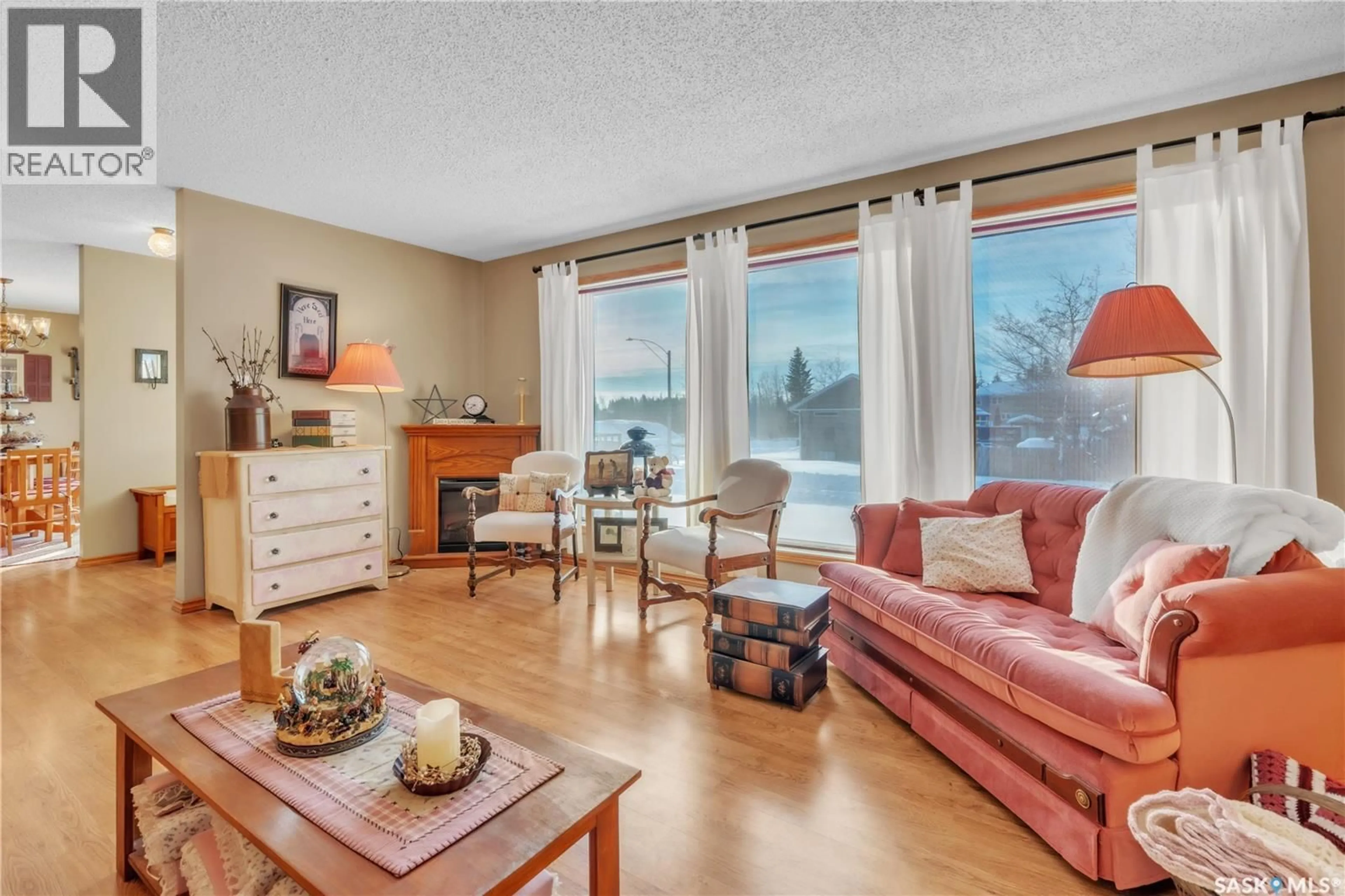 Living room with furniture, wood/laminate floor for 178 4TH STREET, Pierceland Saskatchewan S0M2X0