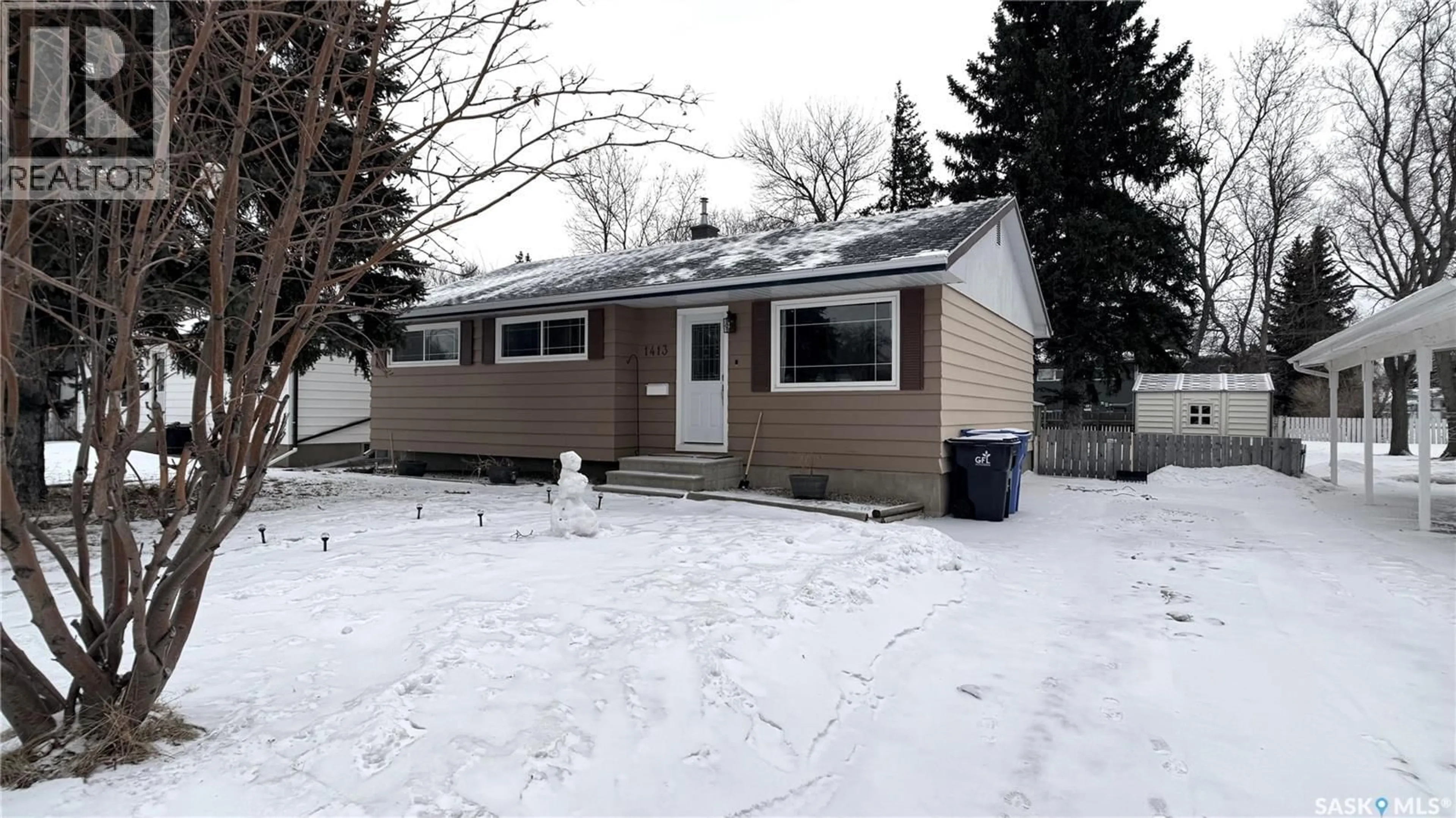 Home with vinyl exterior material, street for 1413 NICHOLSON ROAD, Estevan Saskatchewan S4A1T6