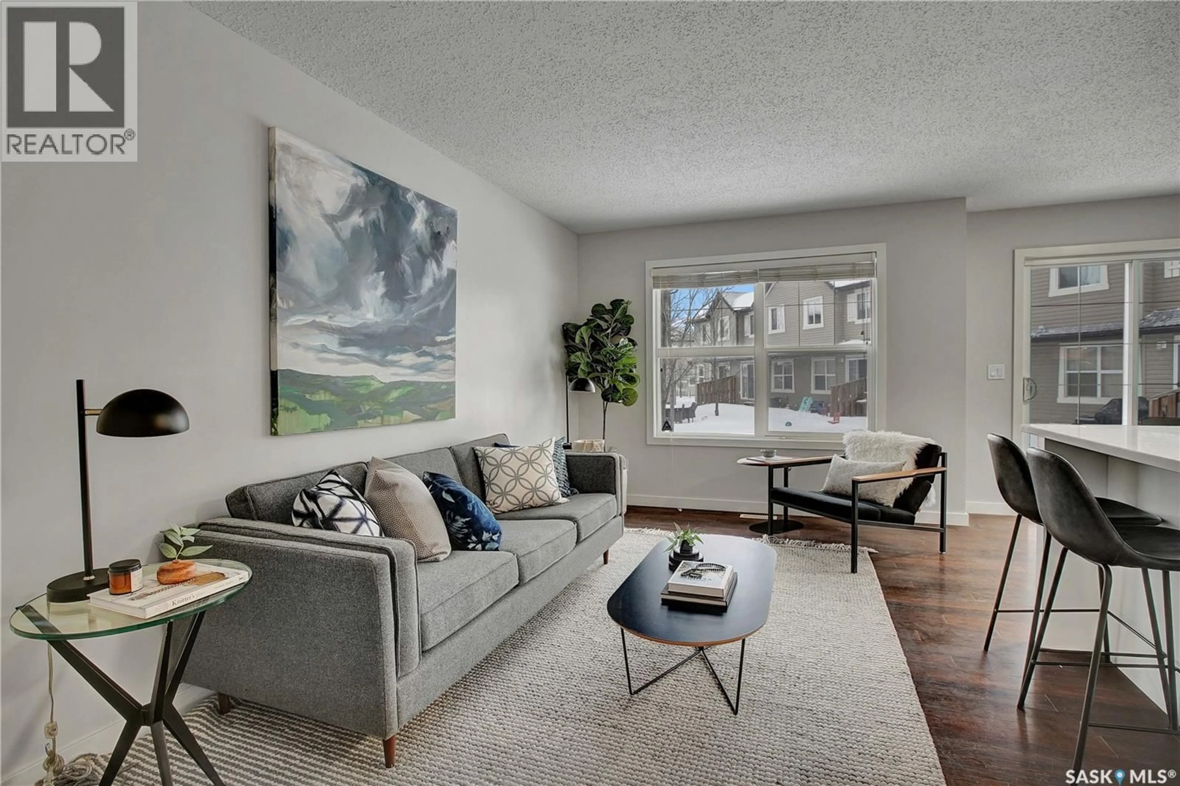 Living room with furniture, unknown for 410 - 214 LEDINGHAM WAY, Saskatoon Saskatchewan S7V0C4