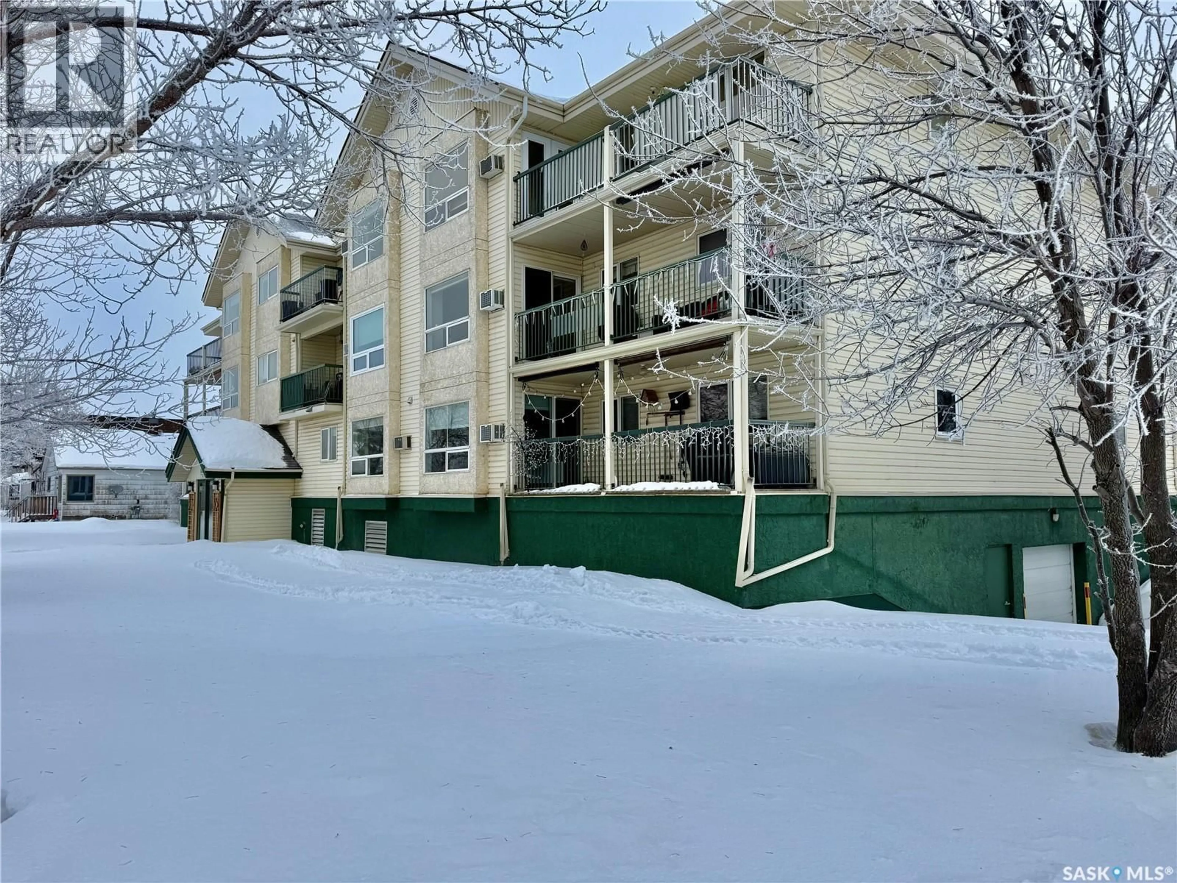 A pic from outside/outdoor area/front of a property/back of a property/a pic from drone, unknown for 105 602 7TH STREET, Humboldt Saskatchewan S0K2A0