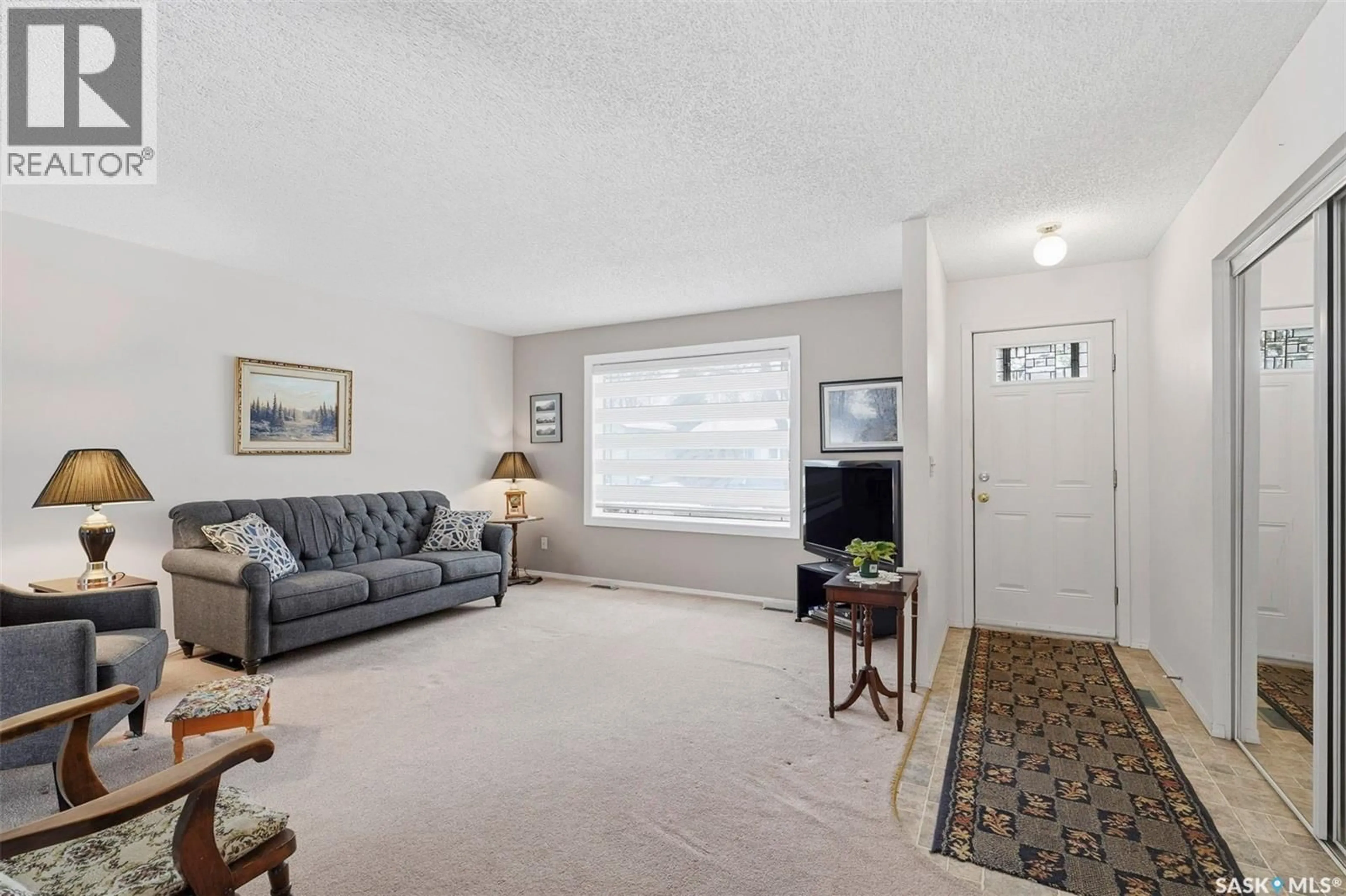 Living room with furniture, unknown for 1007 KINGSMERE BOULEVARD, Saskatoon Saskatchewan S7J5A7