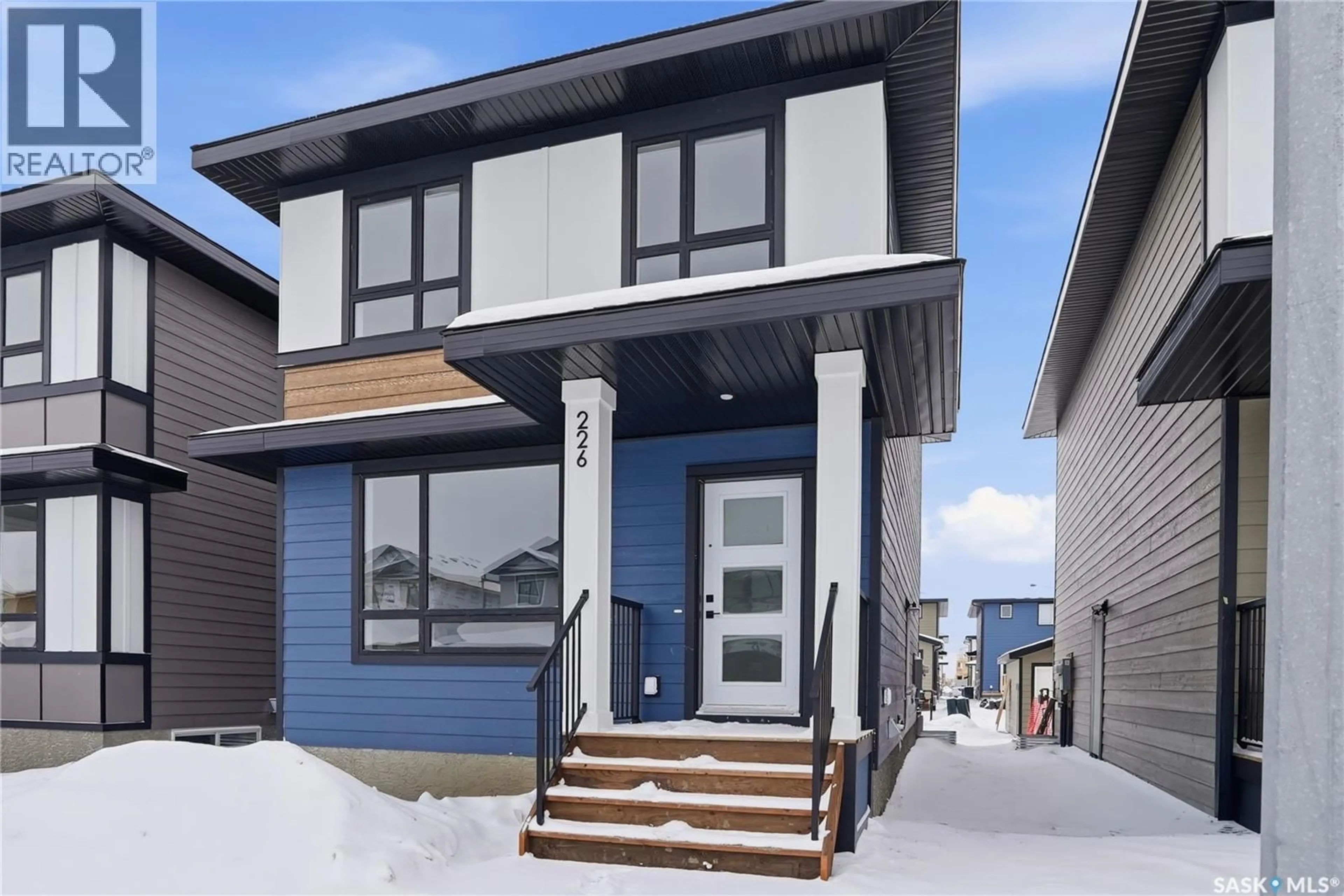 Home with vinyl exterior material, street for 238 LESKIW LANE, Saskatoon Saskatchewan S7V2A4