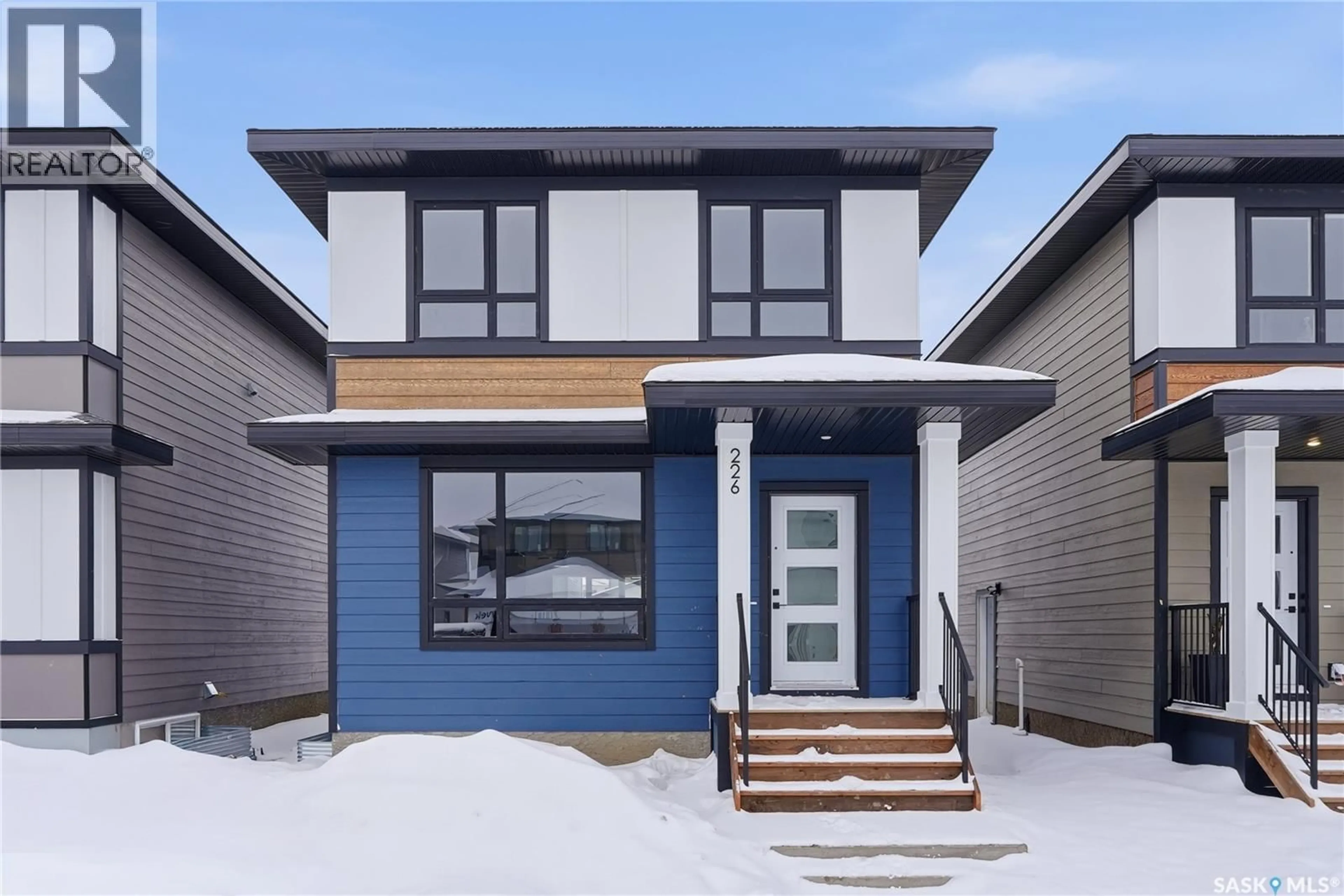 Home with vinyl exterior material, street for 238 LESKIW LANE, Saskatoon Saskatchewan S7V2A4