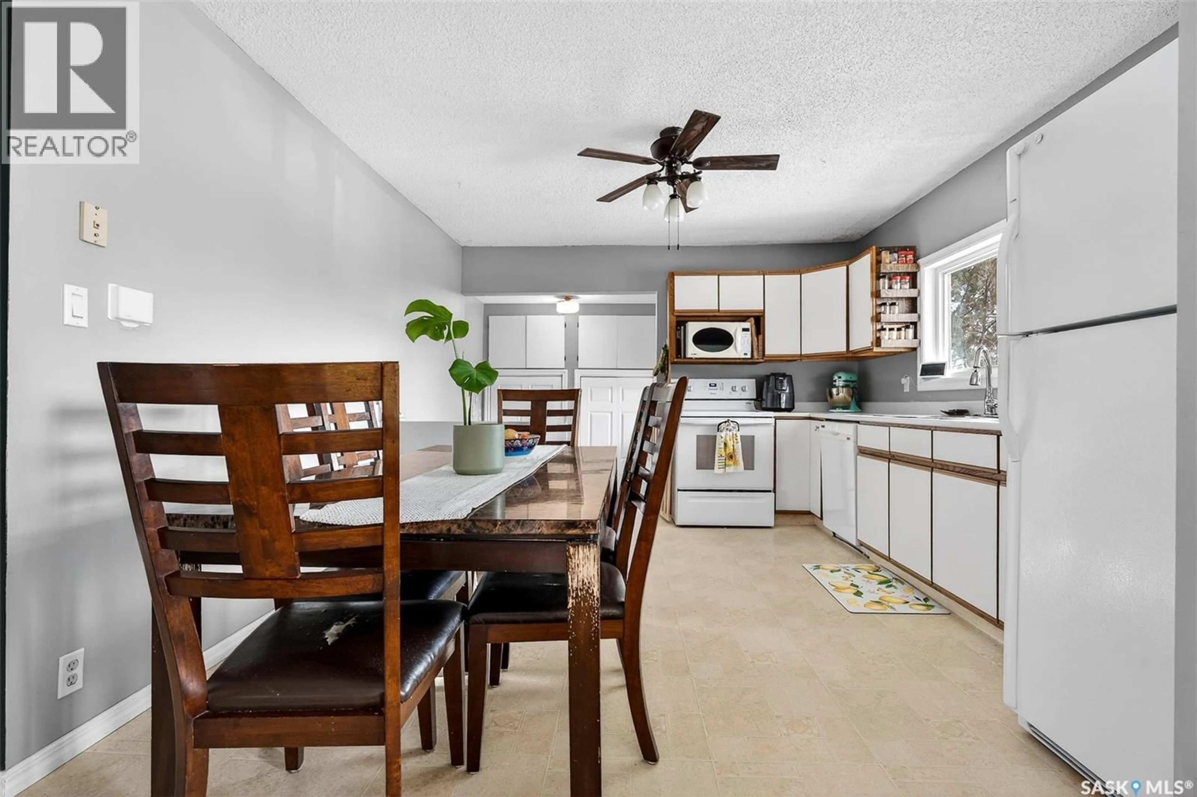 Open concept kitchen, ceramic/tile floor for 928 STADACONA STREET, Moose Jaw Saskatchewan S6H2A8