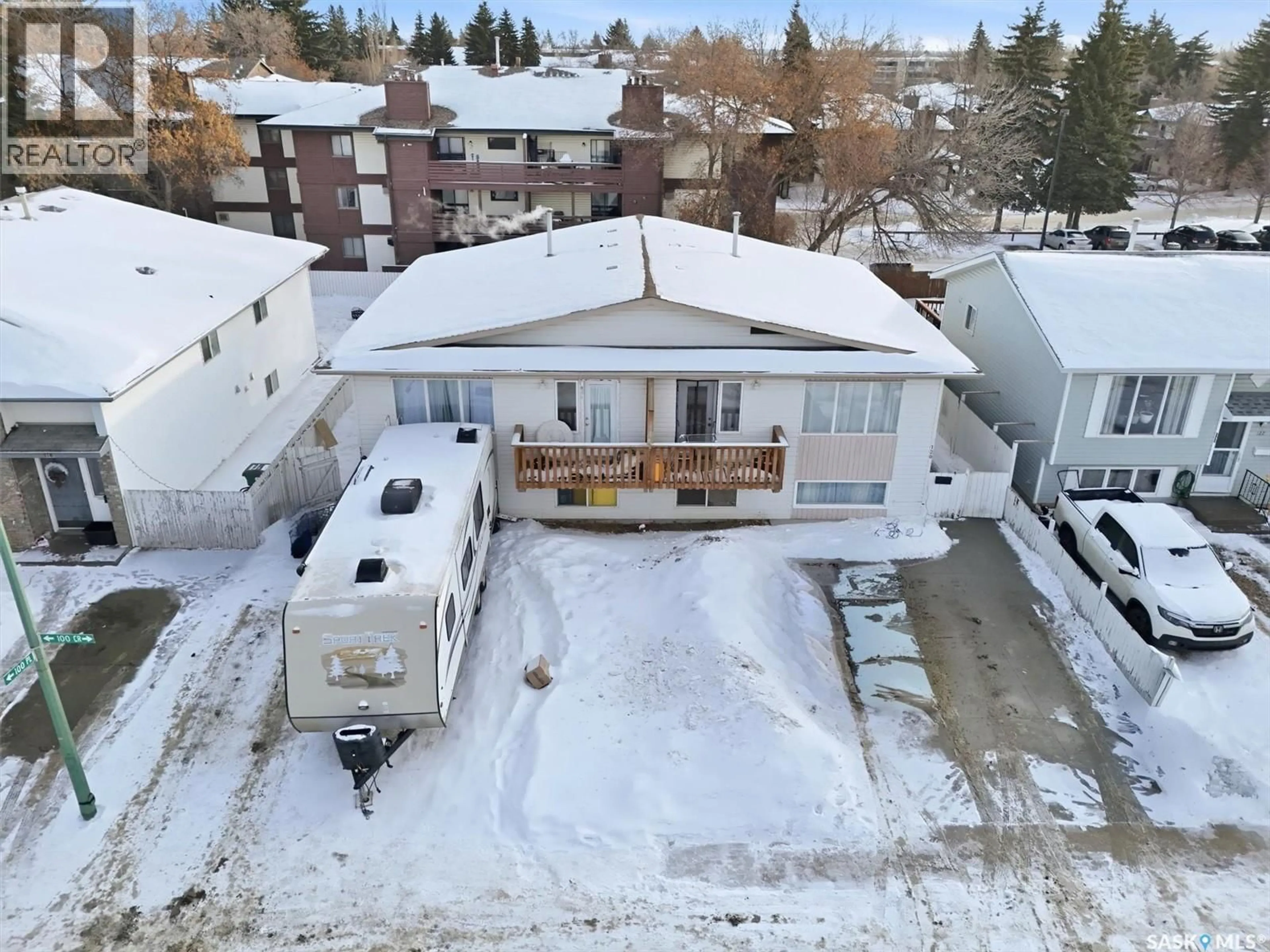 A pic from outside/outdoor area/front of a property/back of a property/a pic from drone, mountain view for 118-120 BARBER CRESCENT, Saskatoon Saskatchewan S7M5M7
