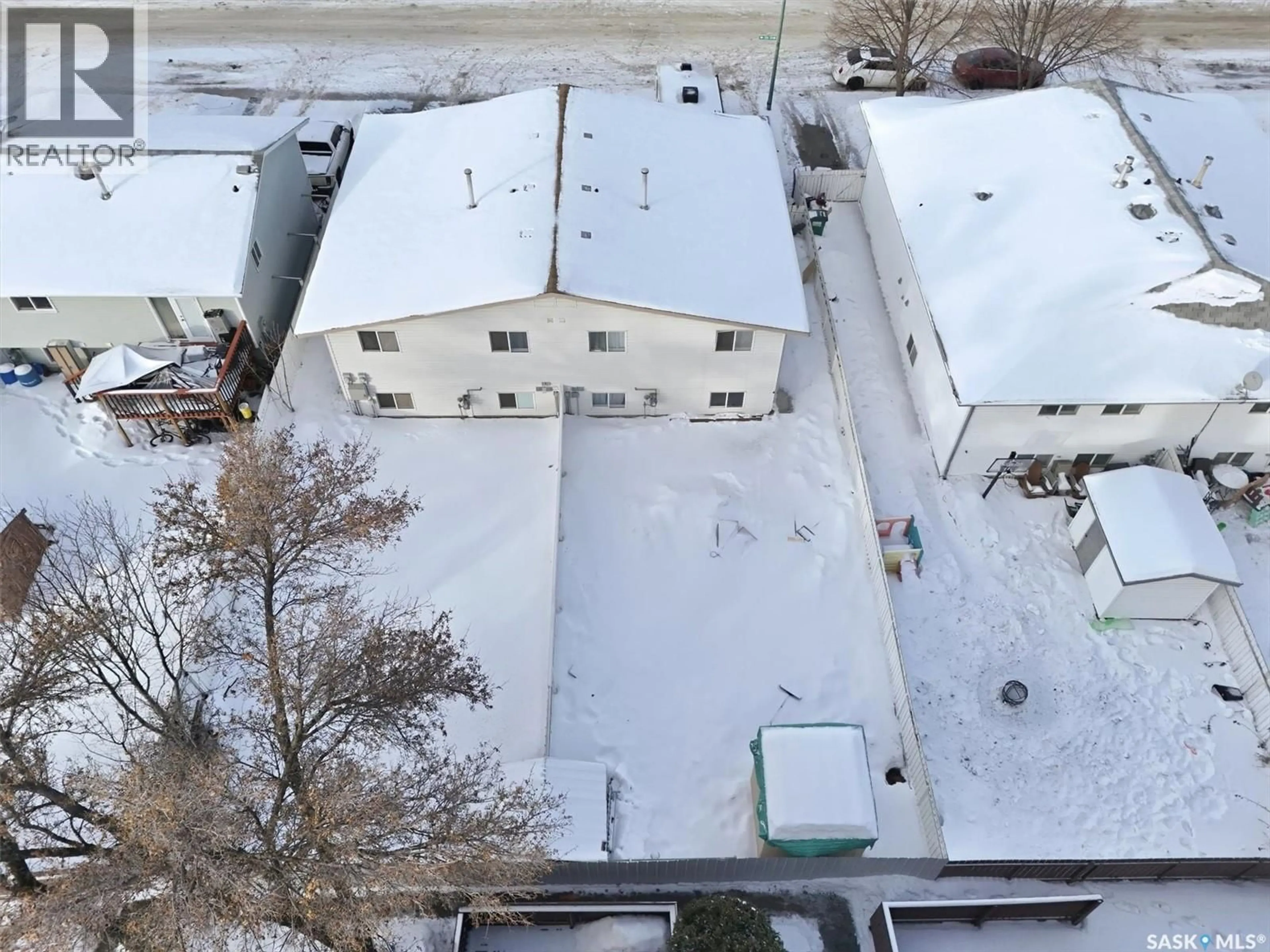 A pic from outside/outdoor area/front of a property/back of a property/a pic from drone, unknown for 118-120 BARBER CRESCENT, Saskatoon Saskatchewan S7M5M7