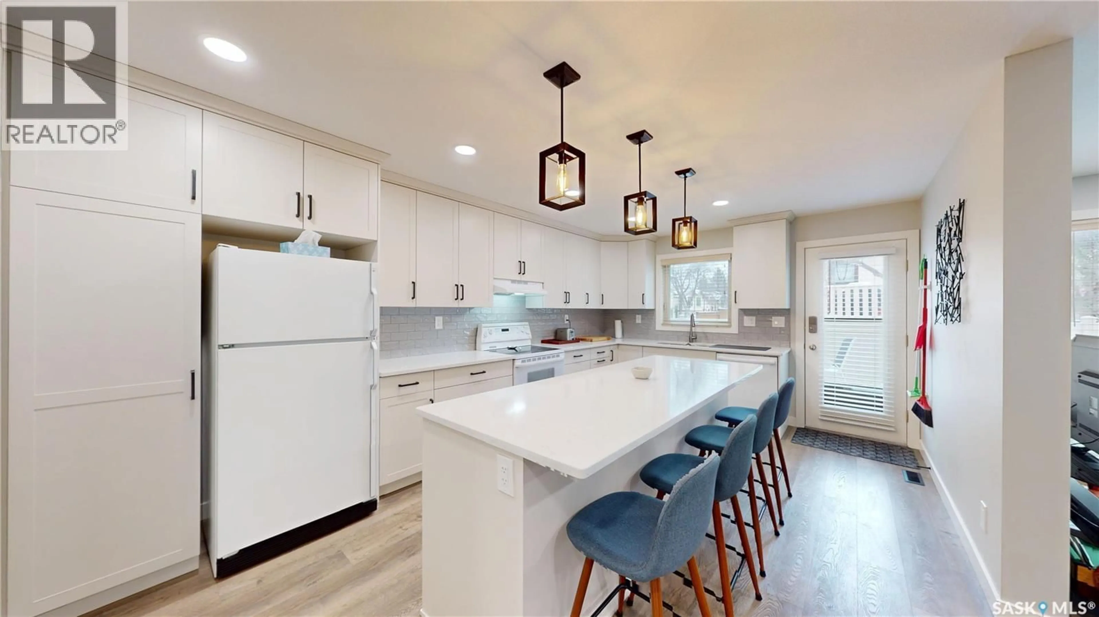 Open concept kitchen, ceramic/tile floor for 520 2510 KENDERDINE ROAD, Saskatoon Saskatchewan S7N4G5