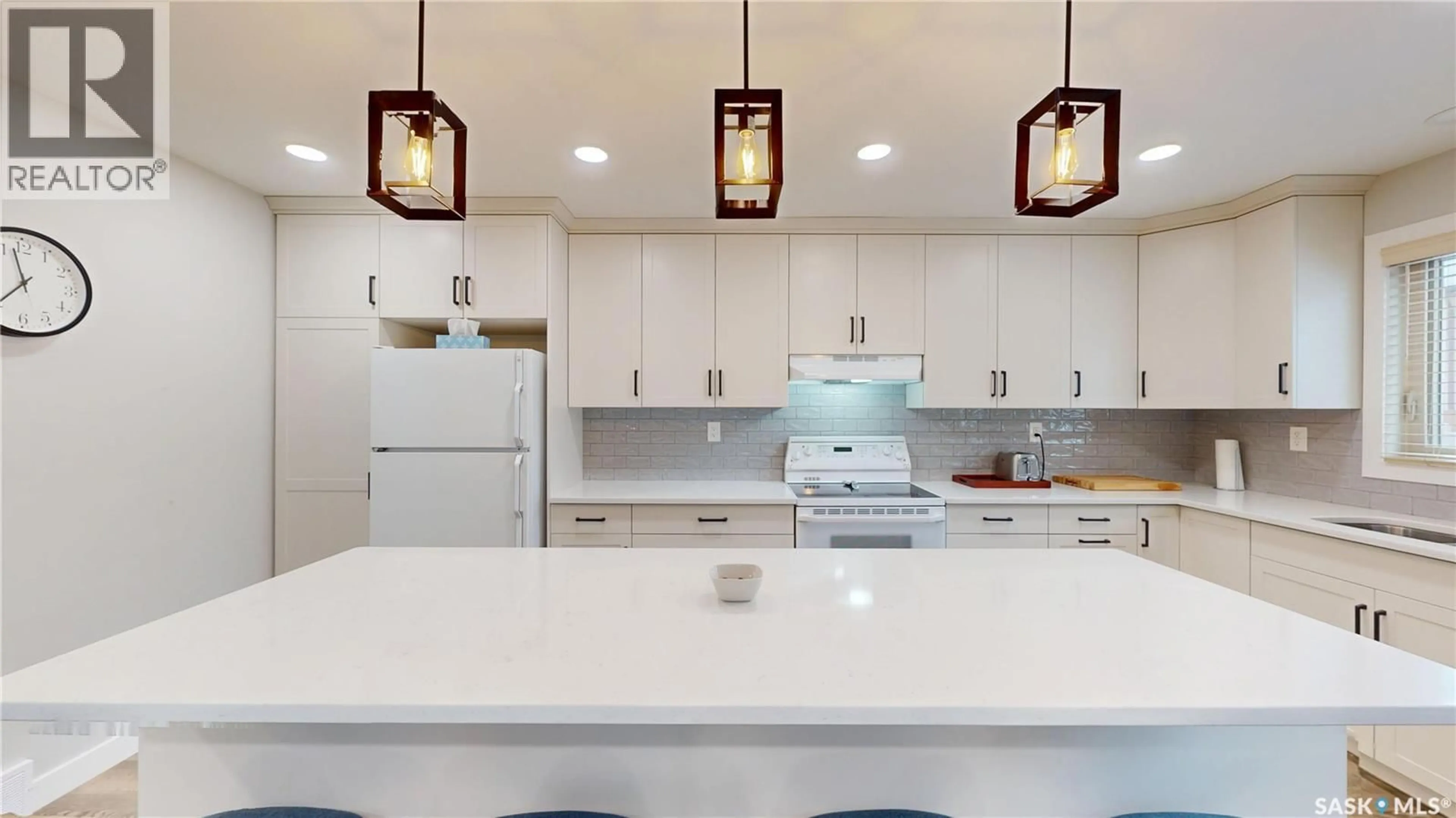 Open concept kitchen, ceramic/tile floor for 520 2510 KENDERDINE ROAD, Saskatoon Saskatchewan S7N4G5