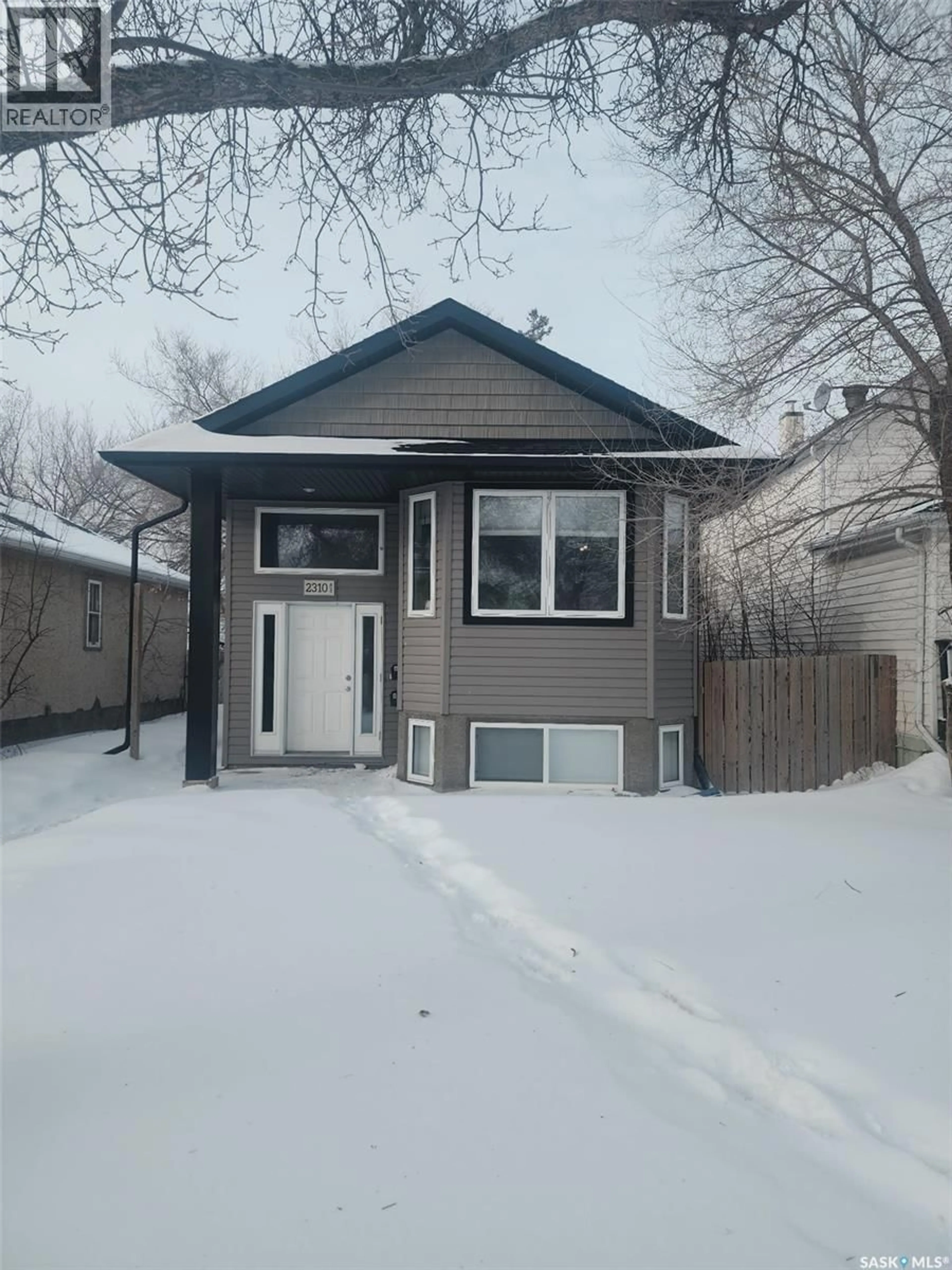 Home with vinyl exterior material, street for 2310 LINDSAY STREET, Regina Saskatchewan S4N3C4