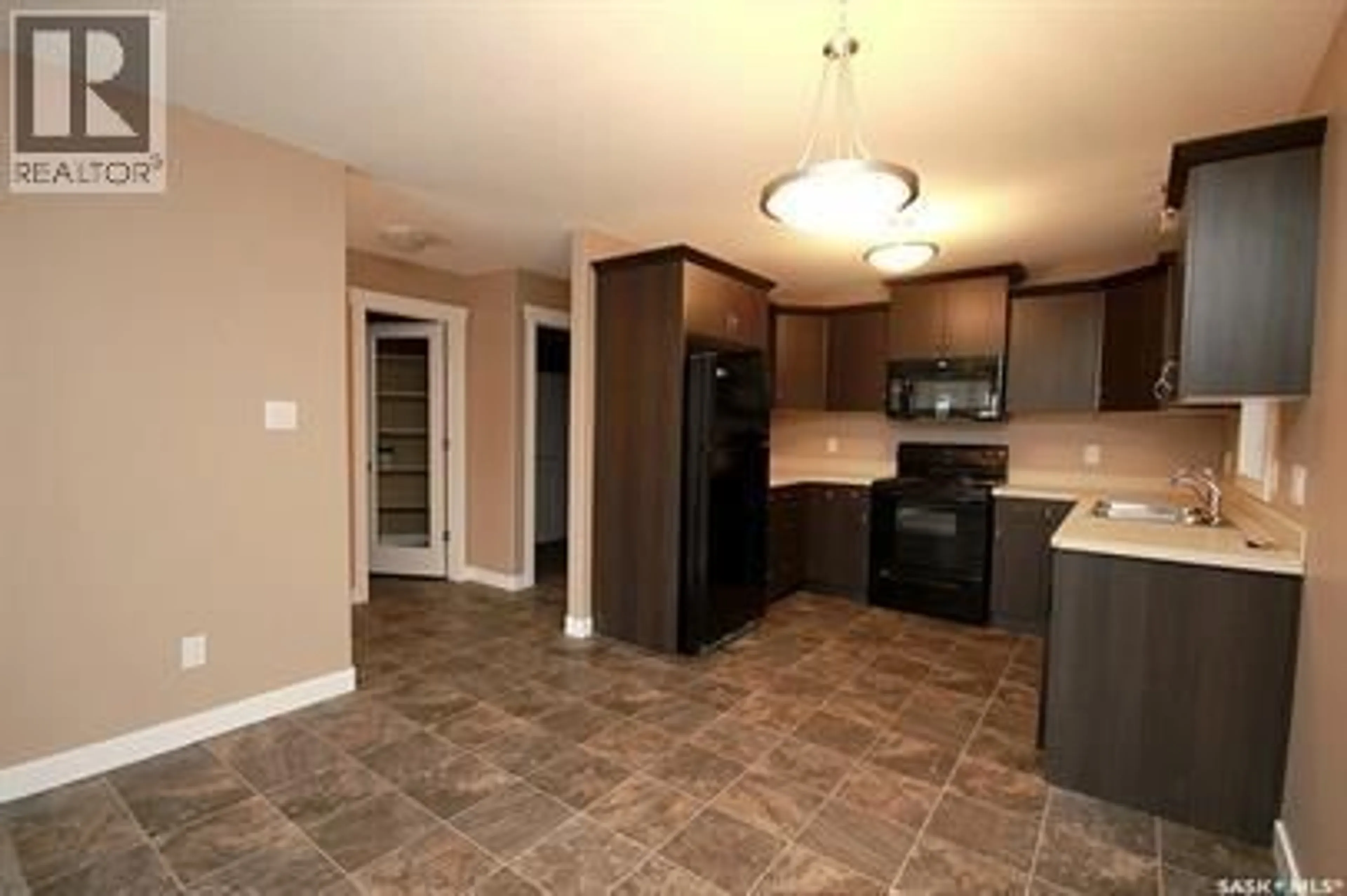 Open concept kitchen, ceramic/tile floor for 2310 LINDSAY STREET, Regina Saskatchewan S4N3C4