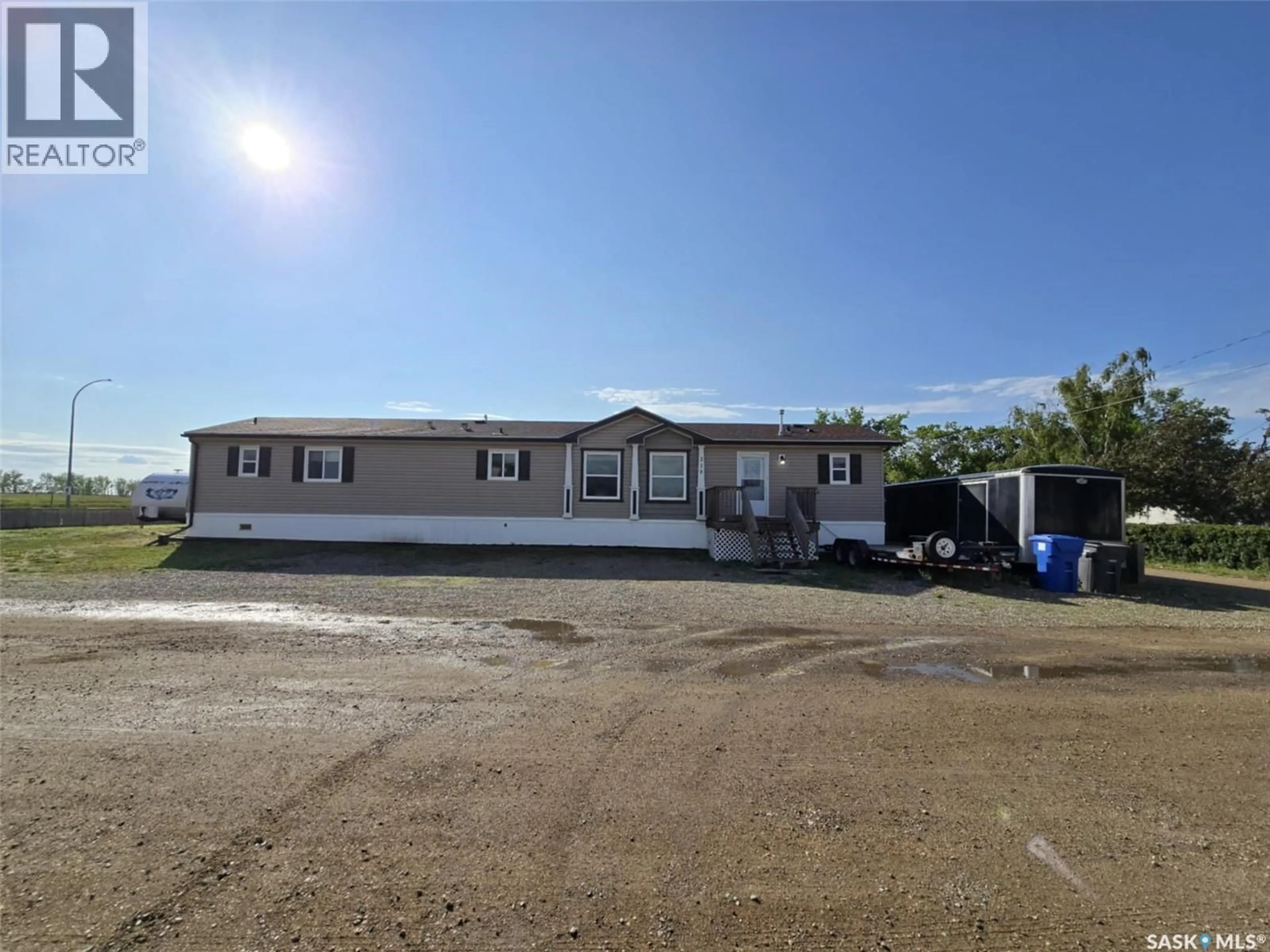 A pic from outside/outdoor area/front of a property/back of a property/a pic from drone, unknown for 219 11 HIGHWAY, Chamberlain Saskatchewan S0G0R0
