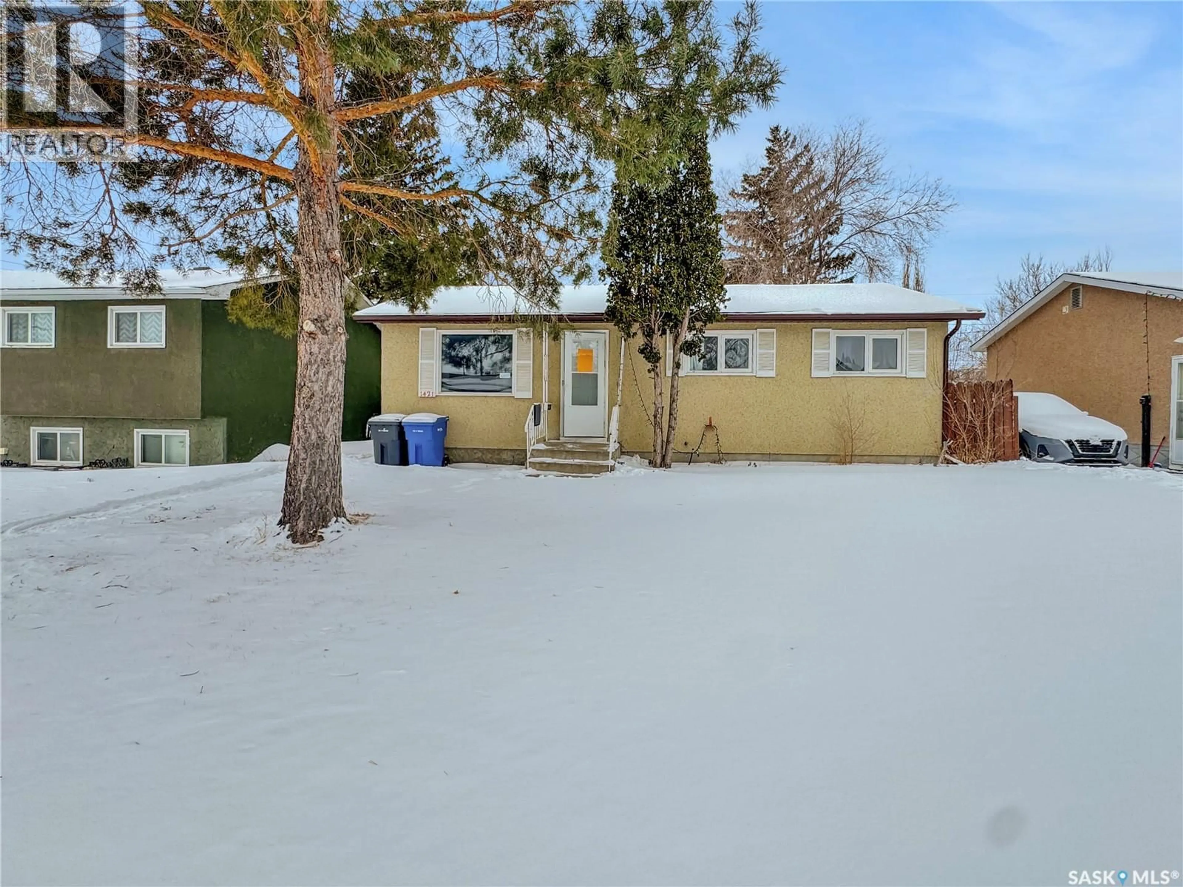 A pic from outside/outdoor area/front of a property/back of a property/a pic from drone, street for 1421 112TH STREET, North Battleford Saskatchewan S9A3B1